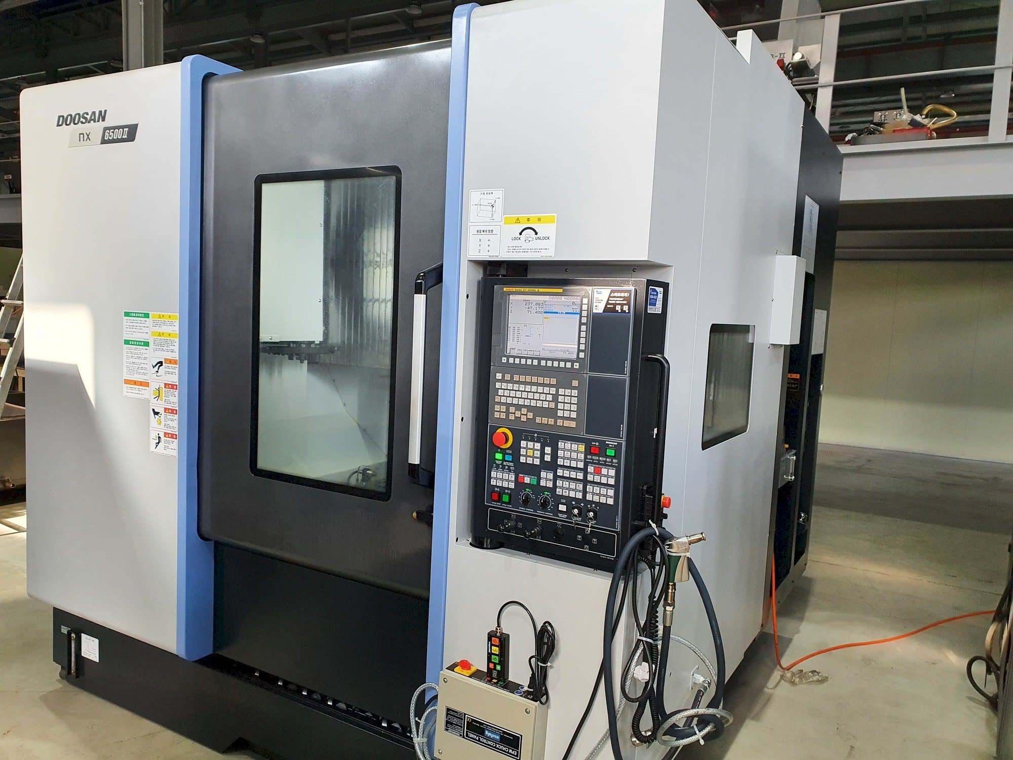 Doosan NX6500Ⅱ-maskinen framifrån