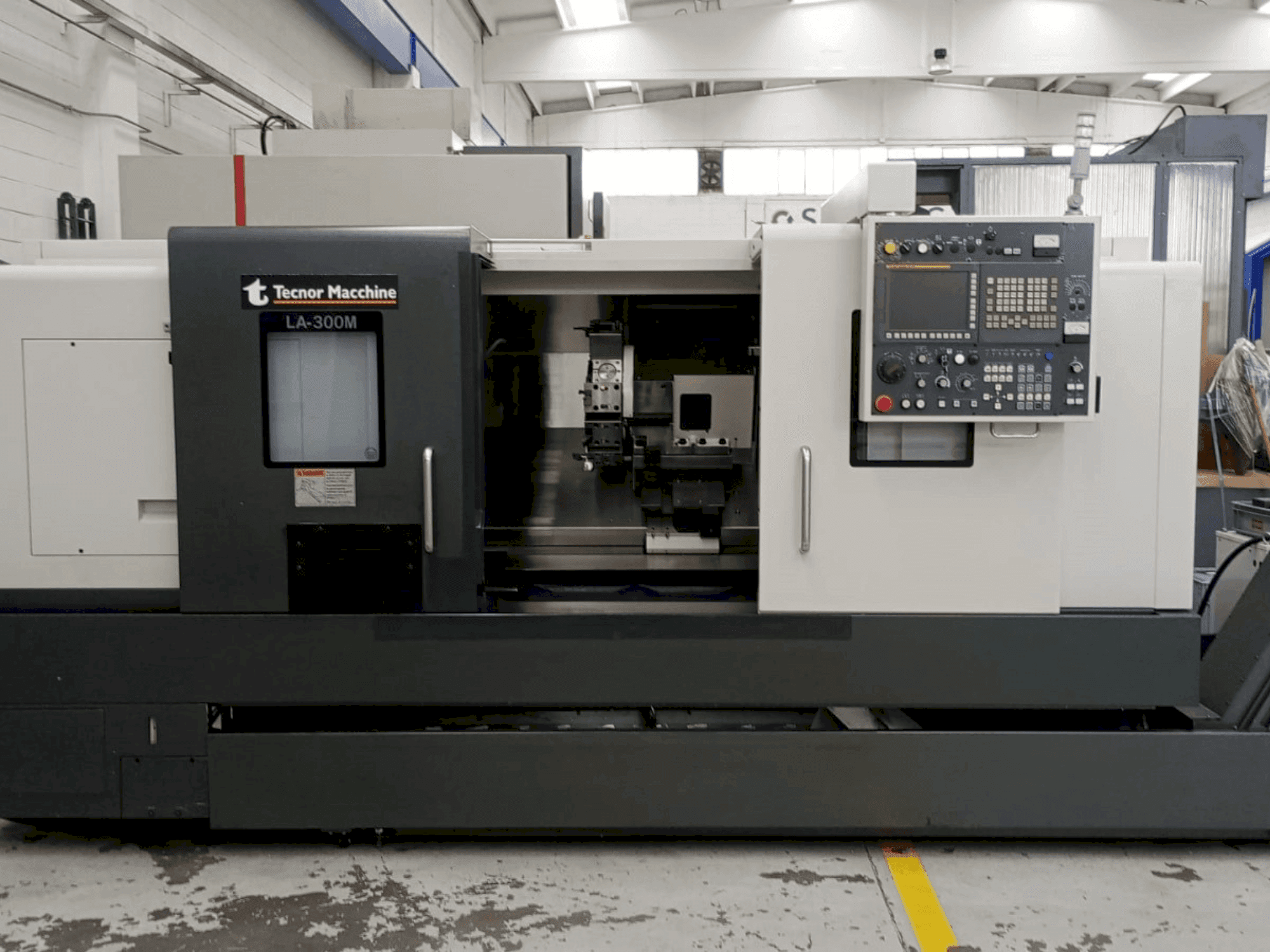 Takisawa LA-300 CNC-maskinen framifrån