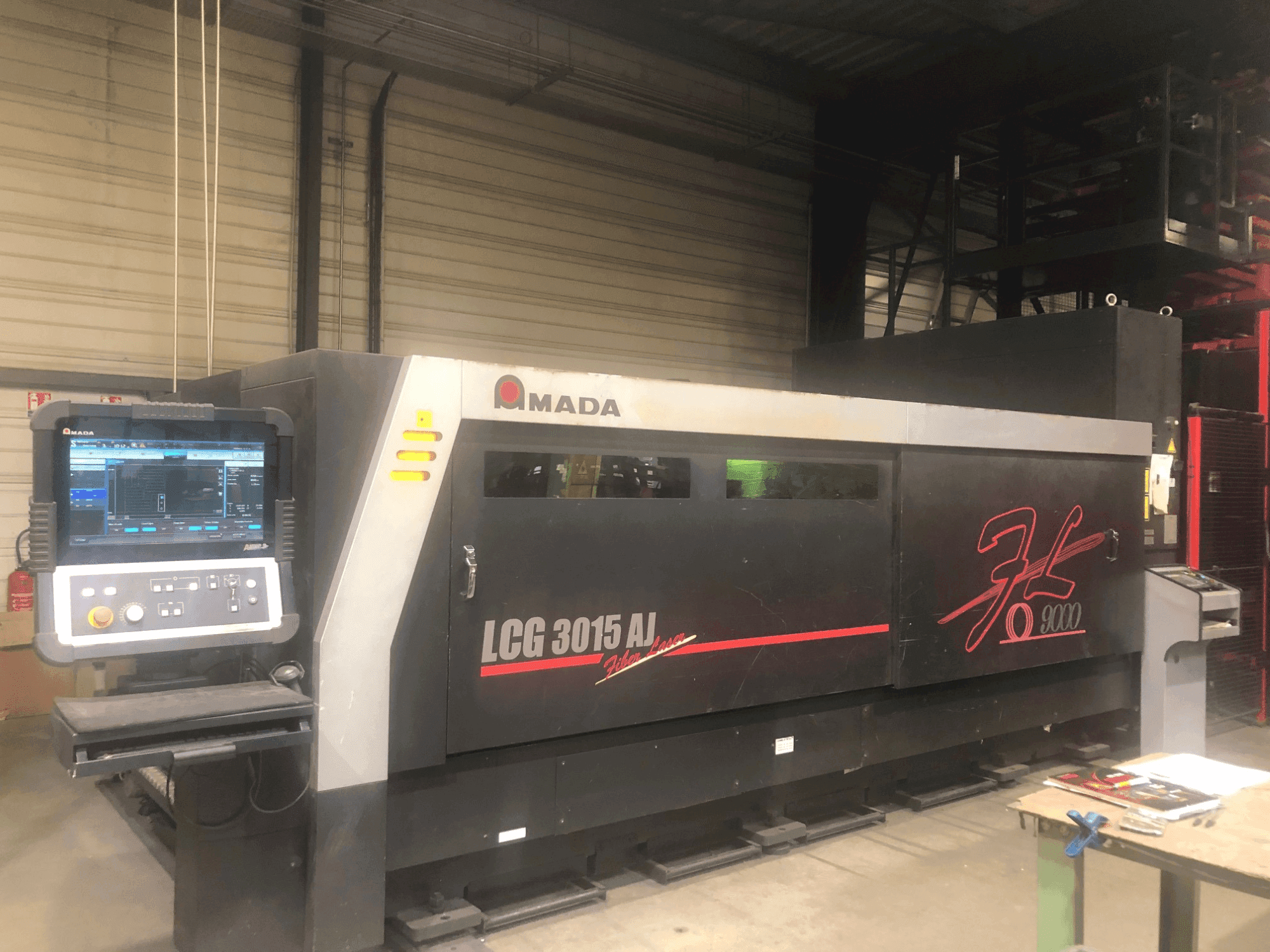 AMADA LCG-3015AJ 9kw + ASLUL TWIN TOWER-maskinen framifrån