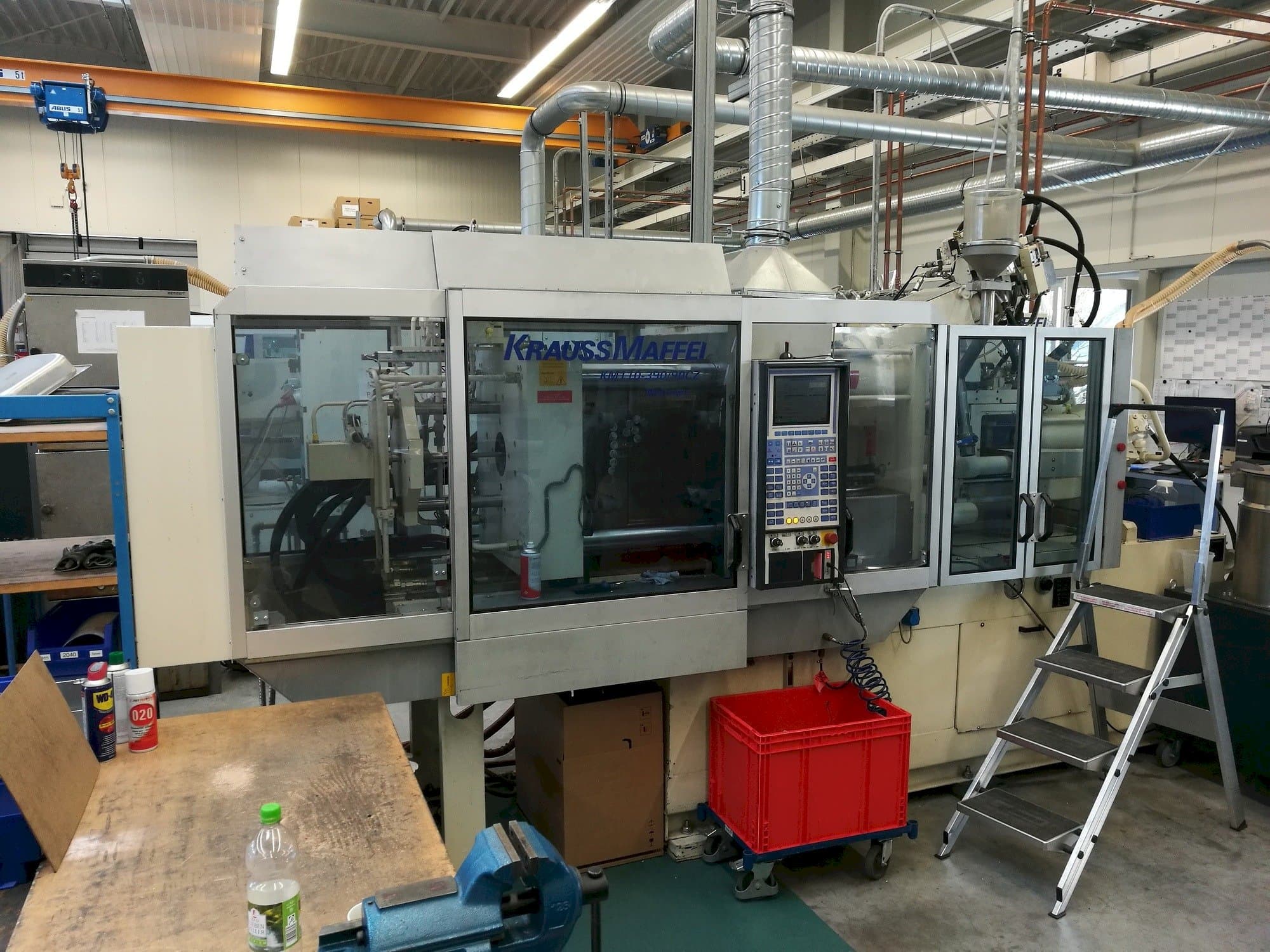 Krauss Maffei 110-390/90 CZ-maskinen framifrån