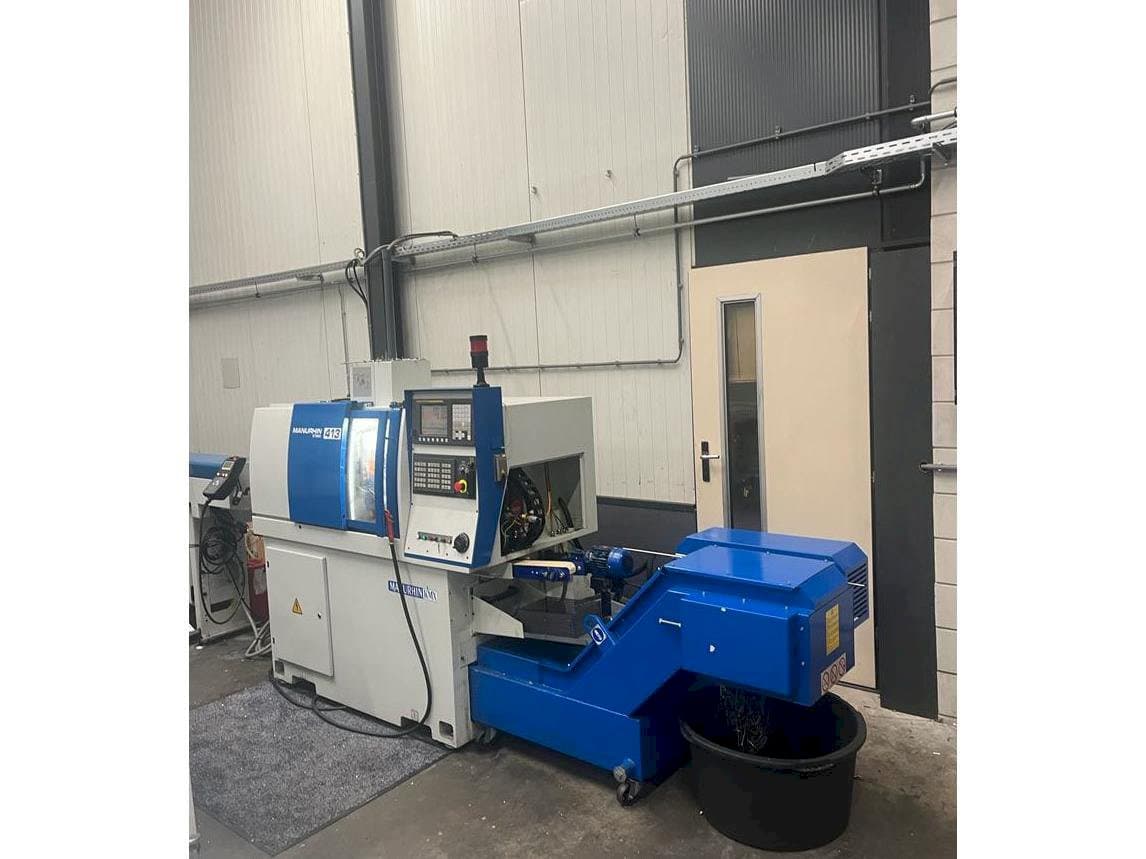 Manurhin K'MX 413-maskinen framifrån