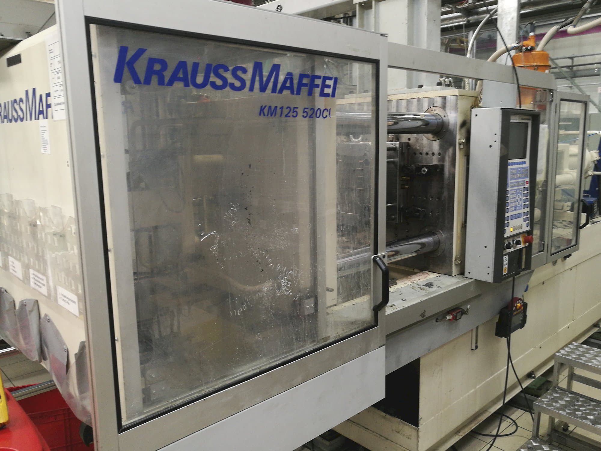 Krauss Maffei-maskinen framifrånKM 125-520 C1