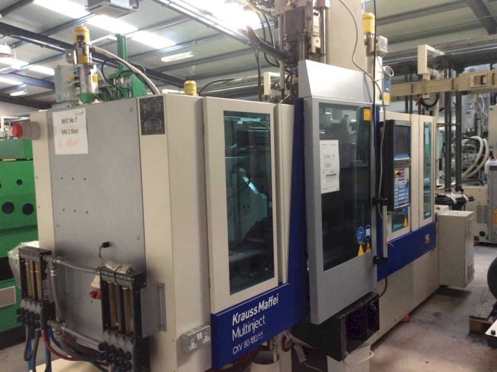 Krauss Maffei Multinject 80-180-55 CX V-maskinen framifrån