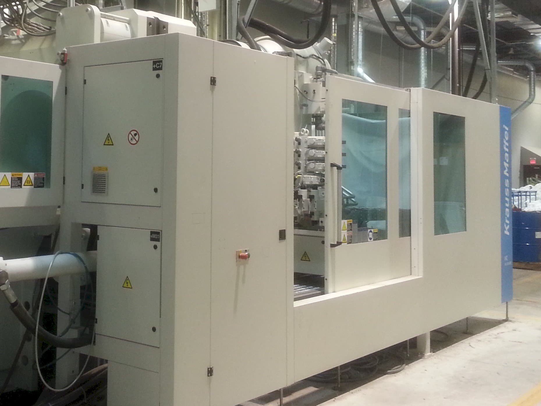 Krauss Maffei 1300-14000 MX IMC-maskinen framifrån