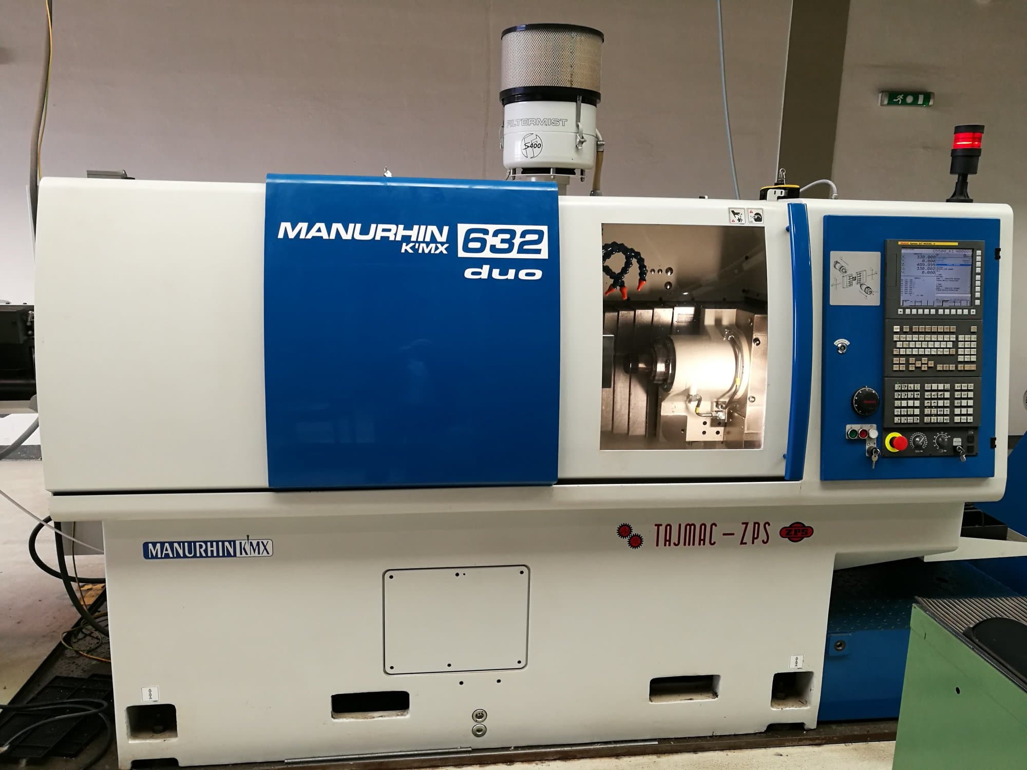 TAJMAC-ZPS-maskinen framifrånMANURHIN K'MX 632 DUO