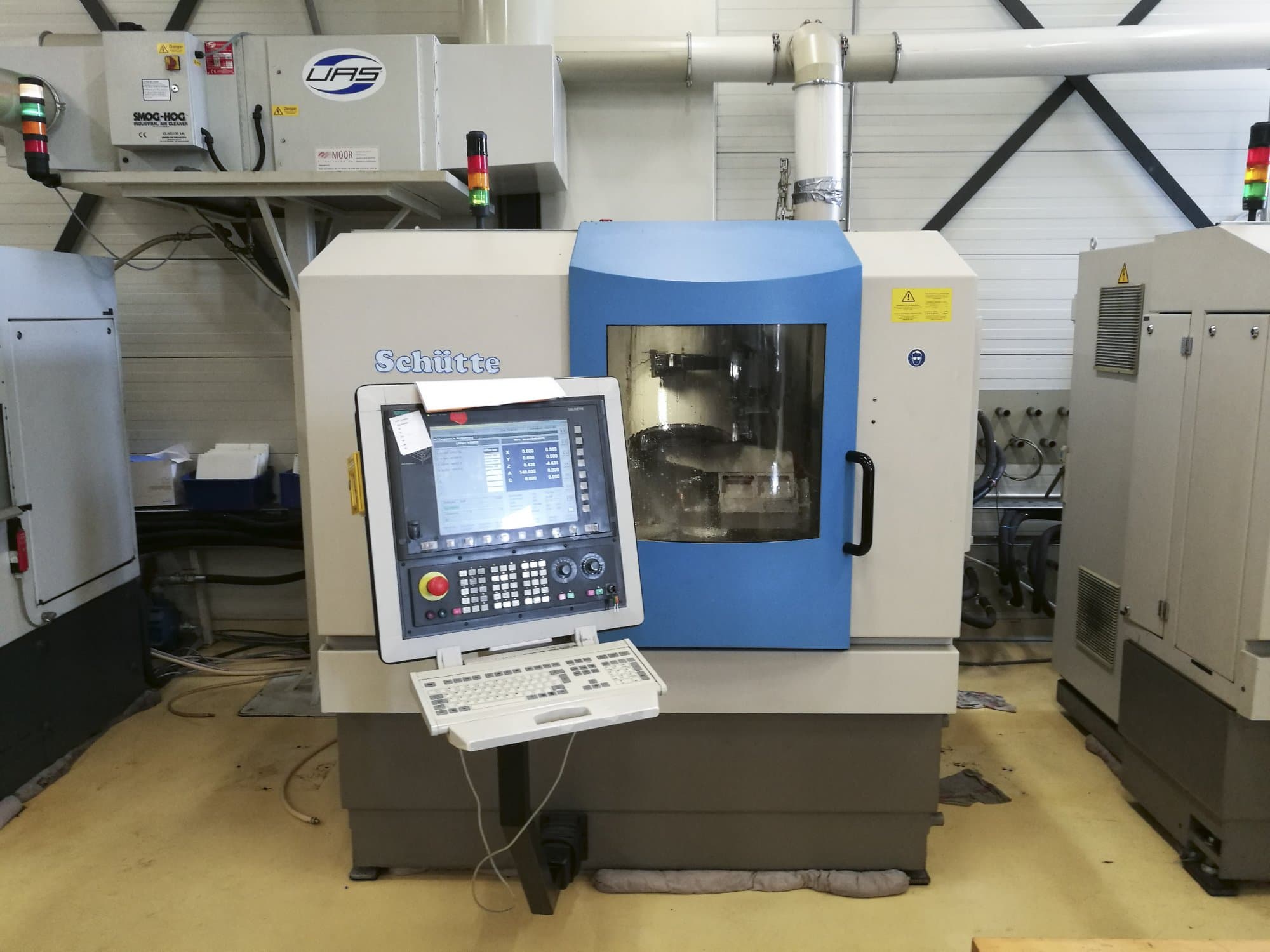 Schuette-maskinen framifrånWU305L