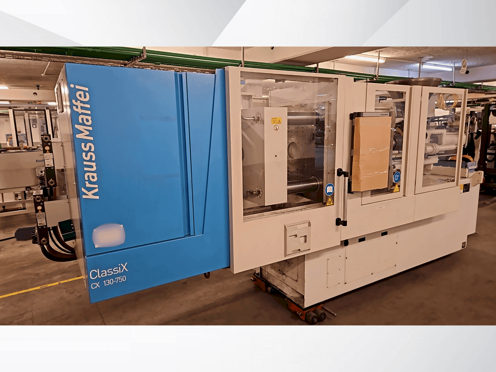Krauss Maffei 130-750 CX-maskinen framifrån