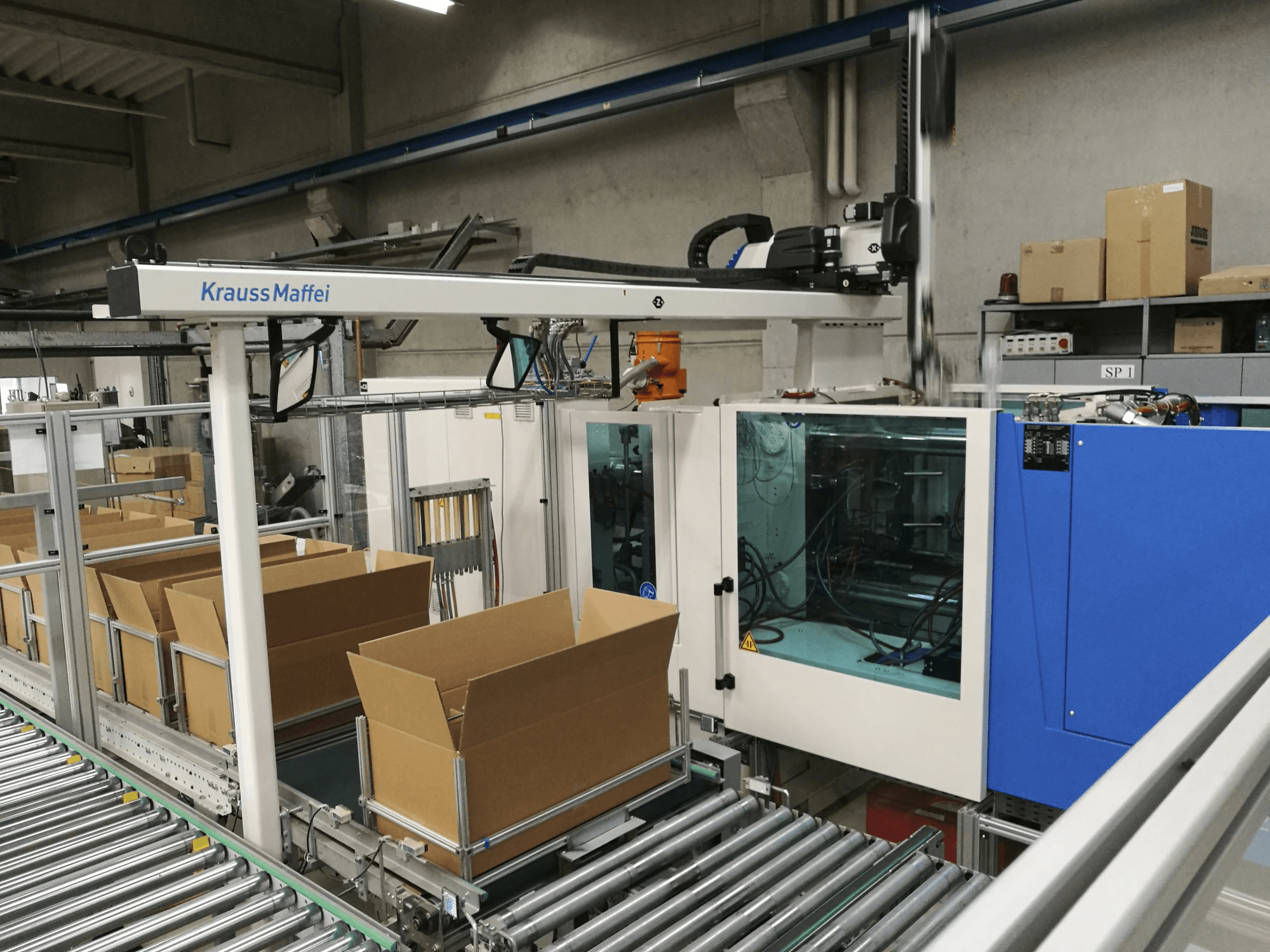 1 Krauss Maffei-maskinen sedd från höger200-750 CX