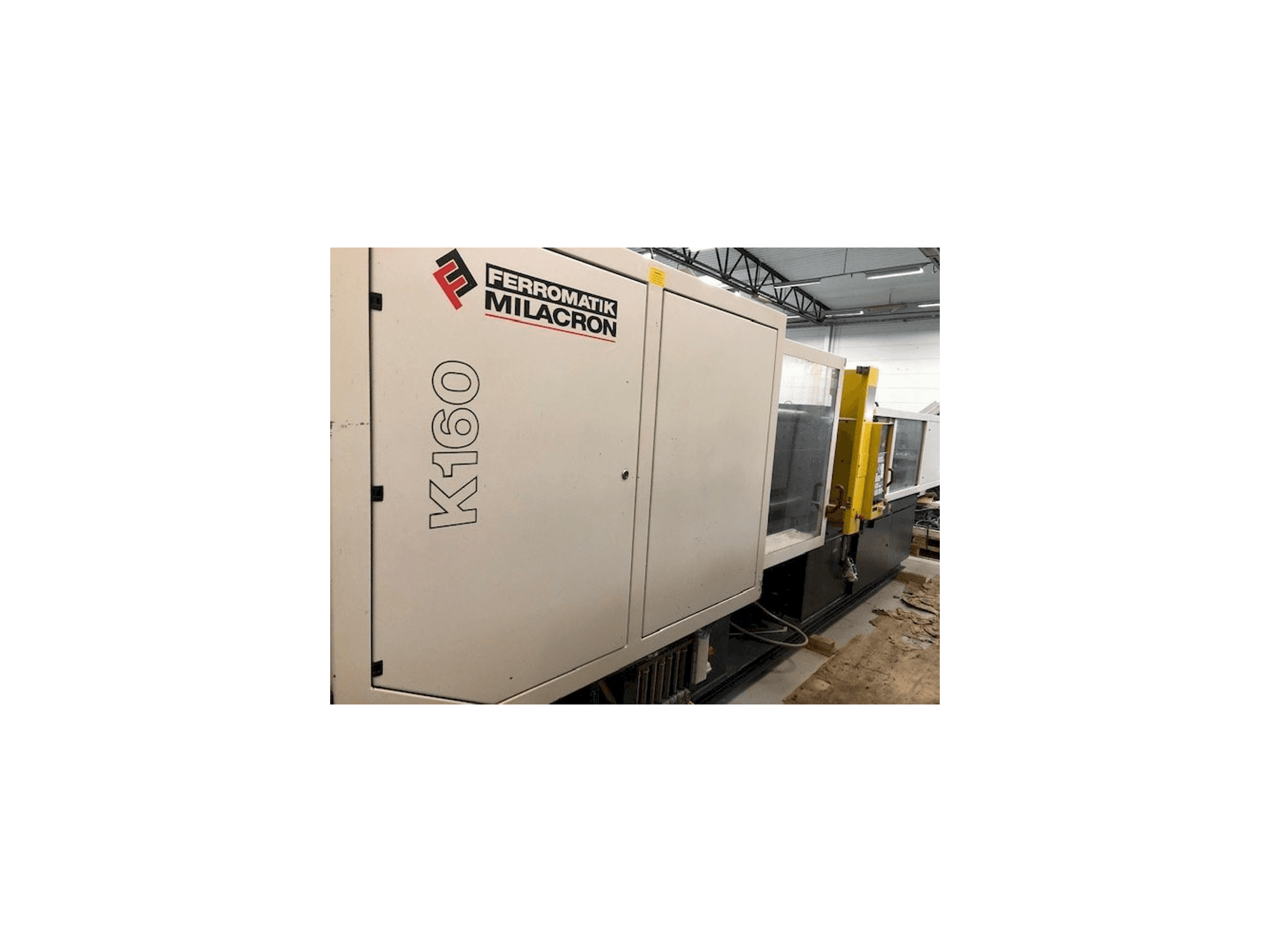 Ferromatik MILACRON K160-maskinen framifrån
