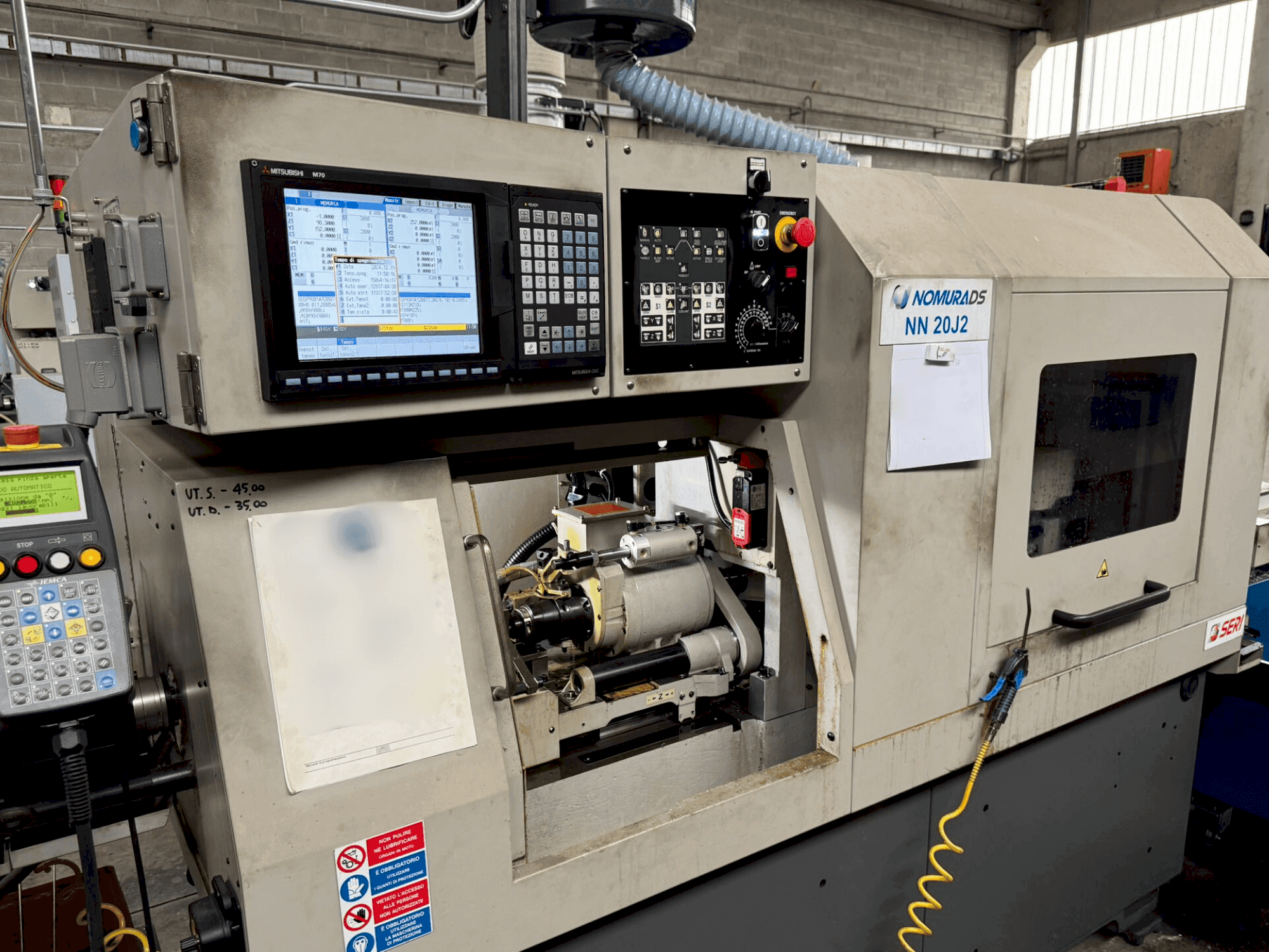 NOMURA NN-20 J2-maskinen framifrån