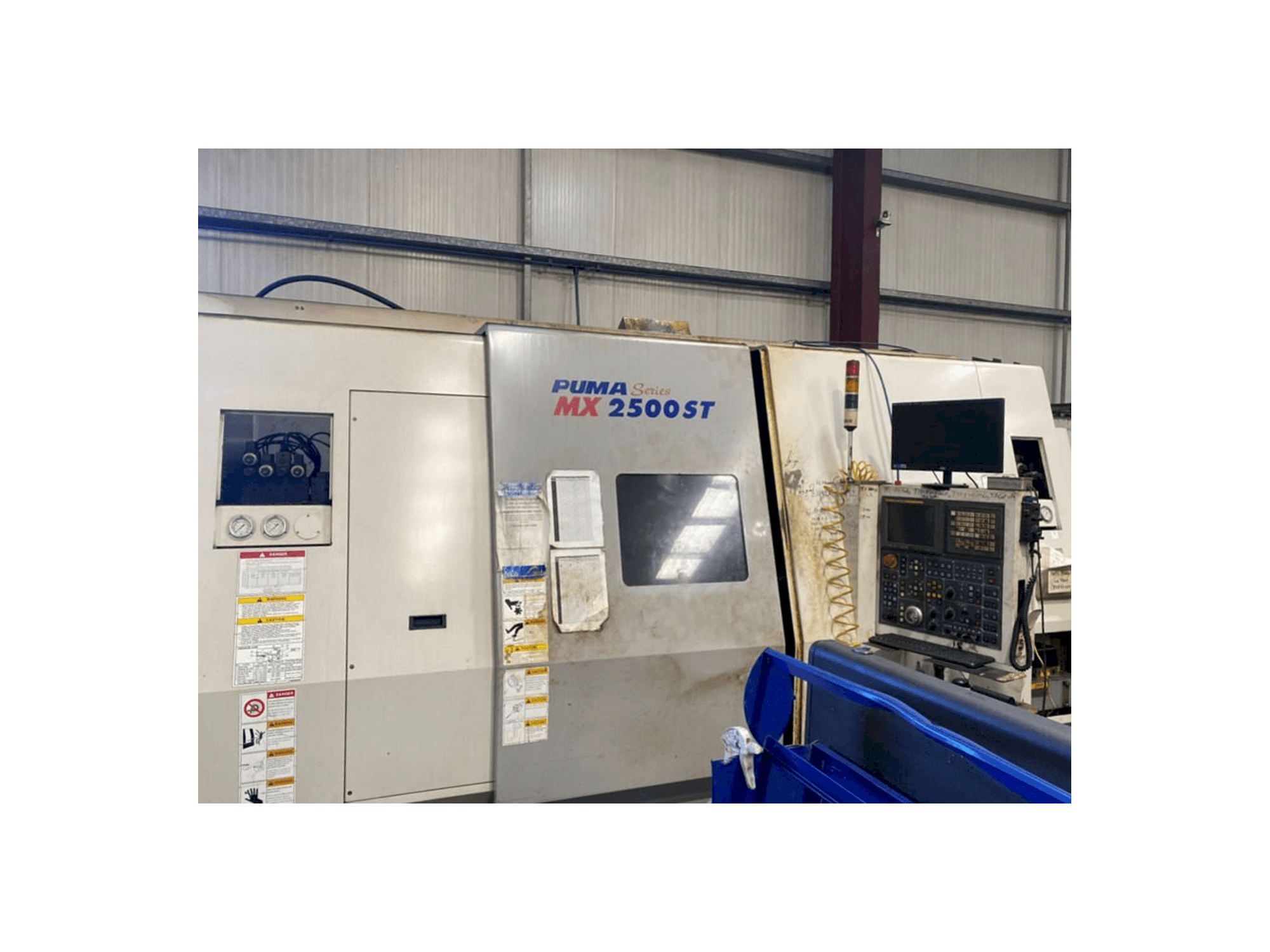 DAEWOO PUMA MX2500ST-maskinen framifrån