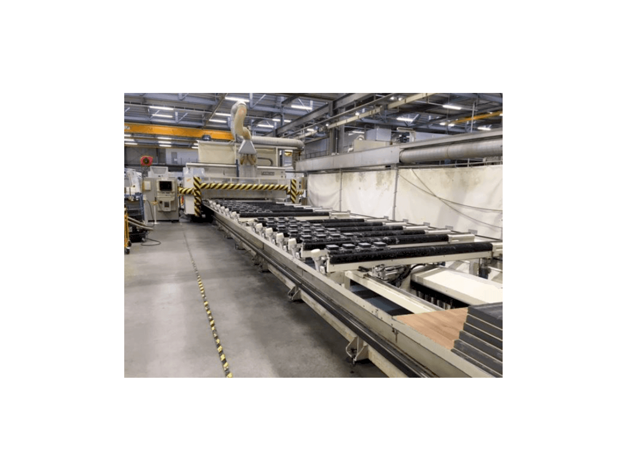 Uniteam 5 achs-maskinen sedd från vänster sida