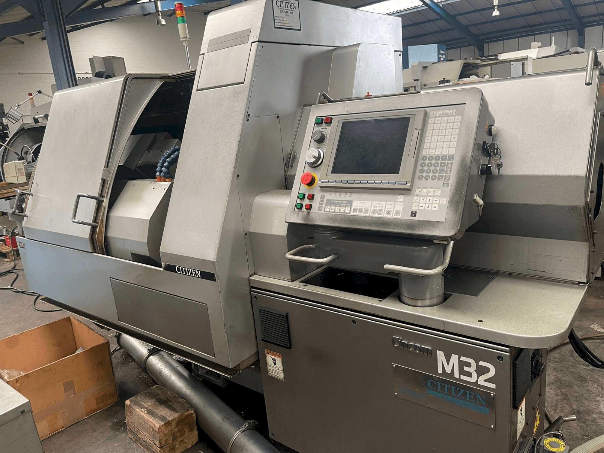 Citizen M-32V-maskinen framifrån