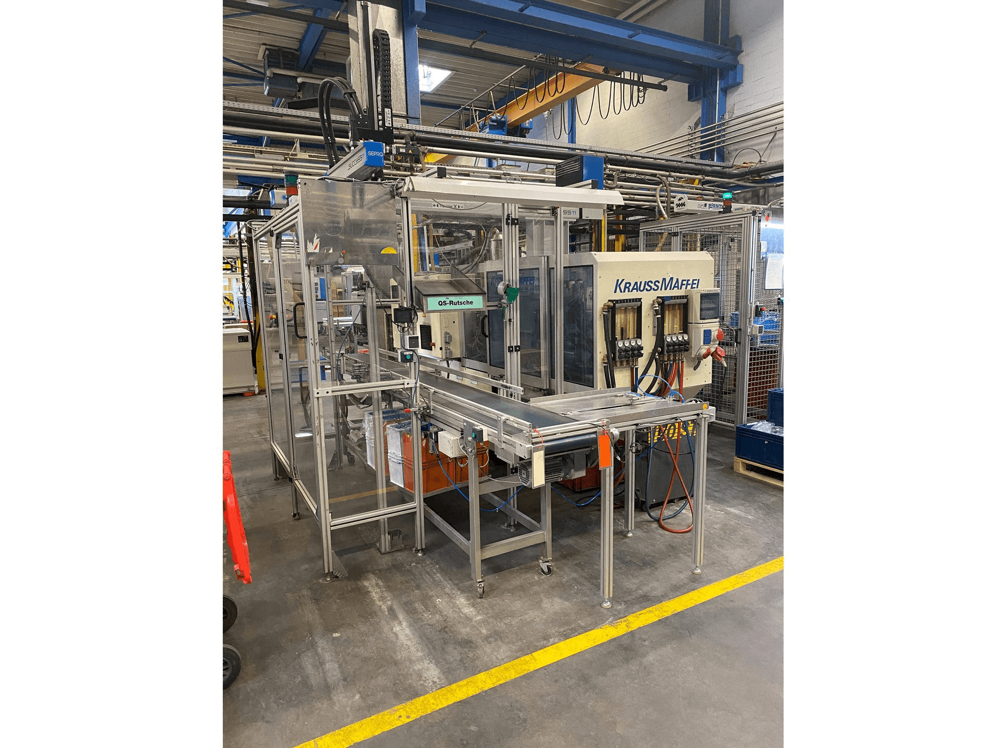 Krauss Maffei 80-390 C2-maskinen framifrån