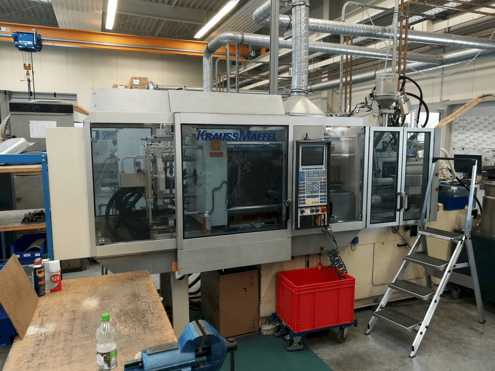 Krauss Maffei 110-390/90 CZ-maskinen framifrån