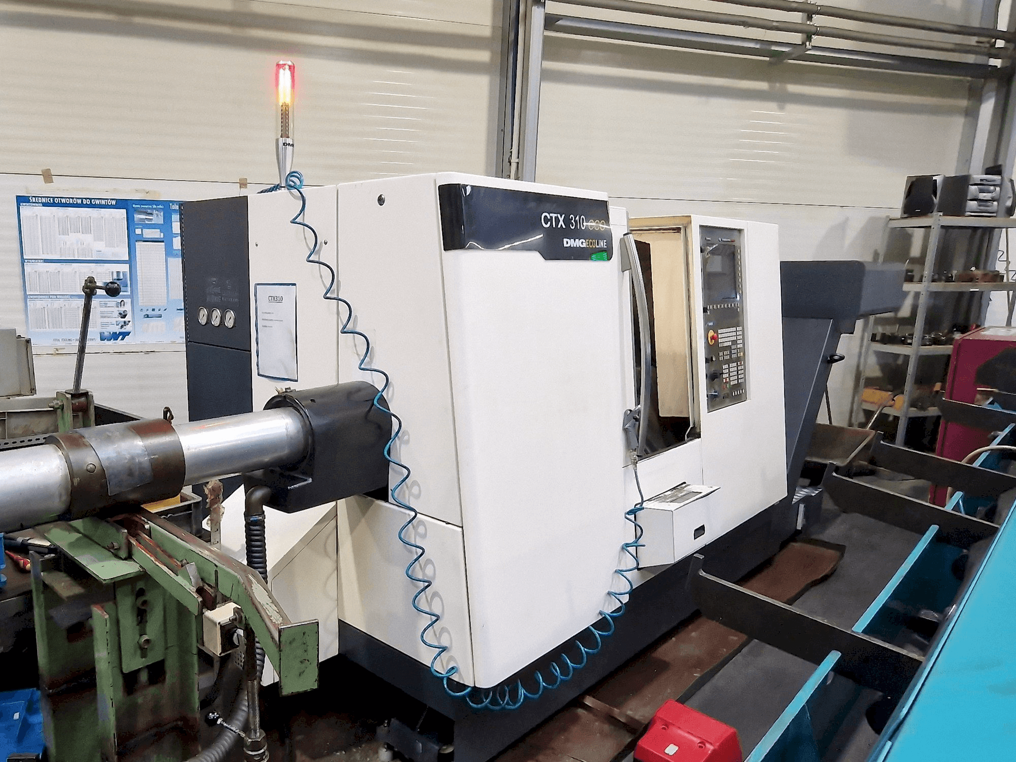 DMG CTX 310 ecoline-maskinen sedd från vänster sida