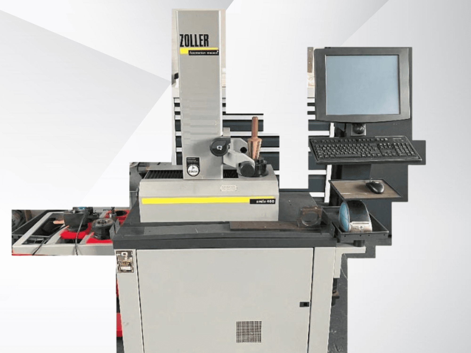 ZOLLER mätmaskin med datorskärm, tangentbord och verktyg; vy framifrån som visar grå färg och modern design.