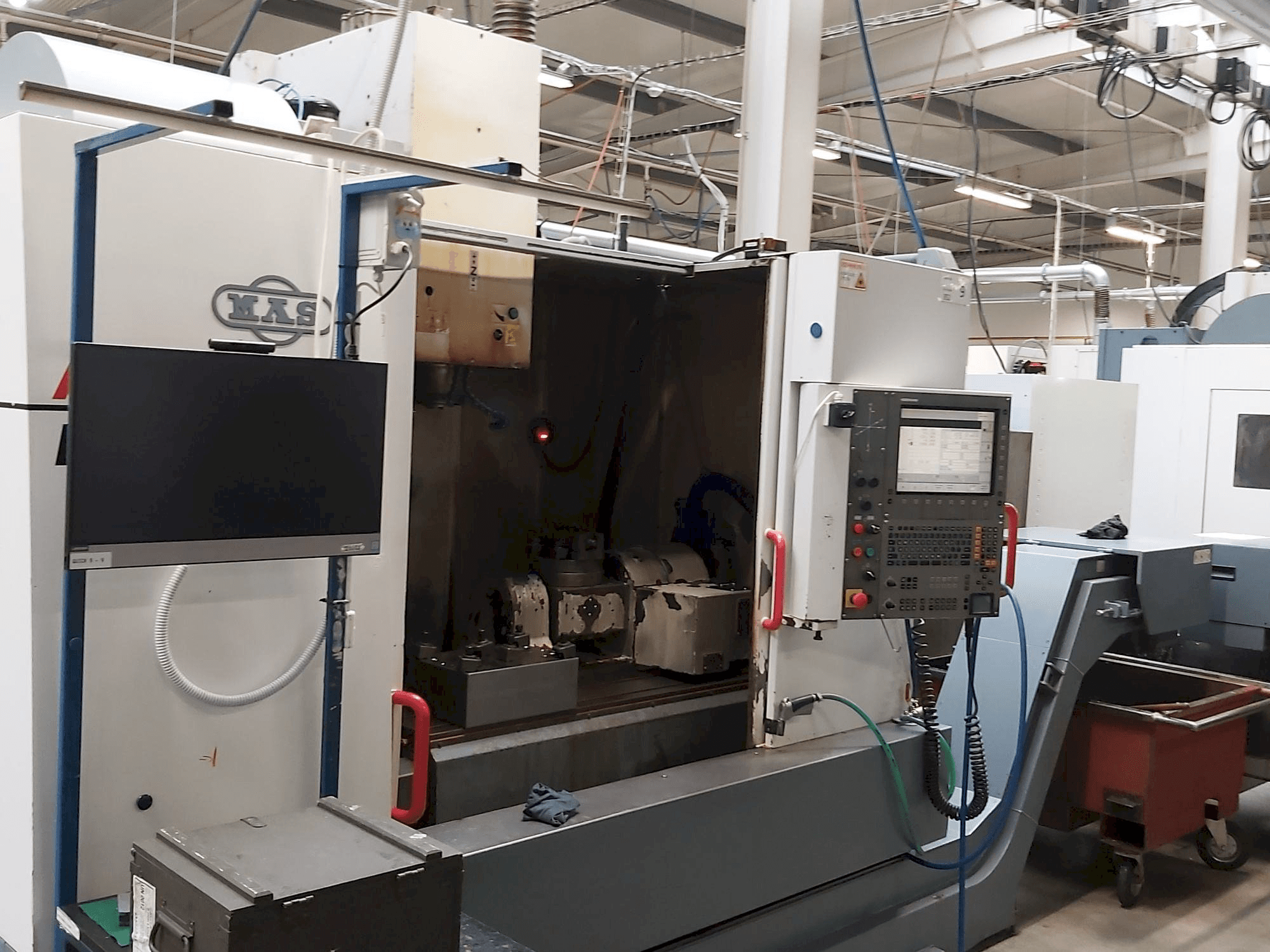 KOVOSVIT MAS MCV 1016 Quick-maskinen sedd från vänster sida