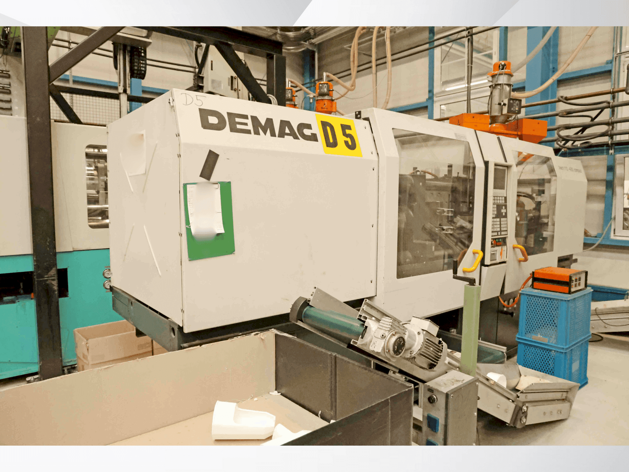DEMAG Ergotech 110-430 NC 4 compact-maskinen framifrån