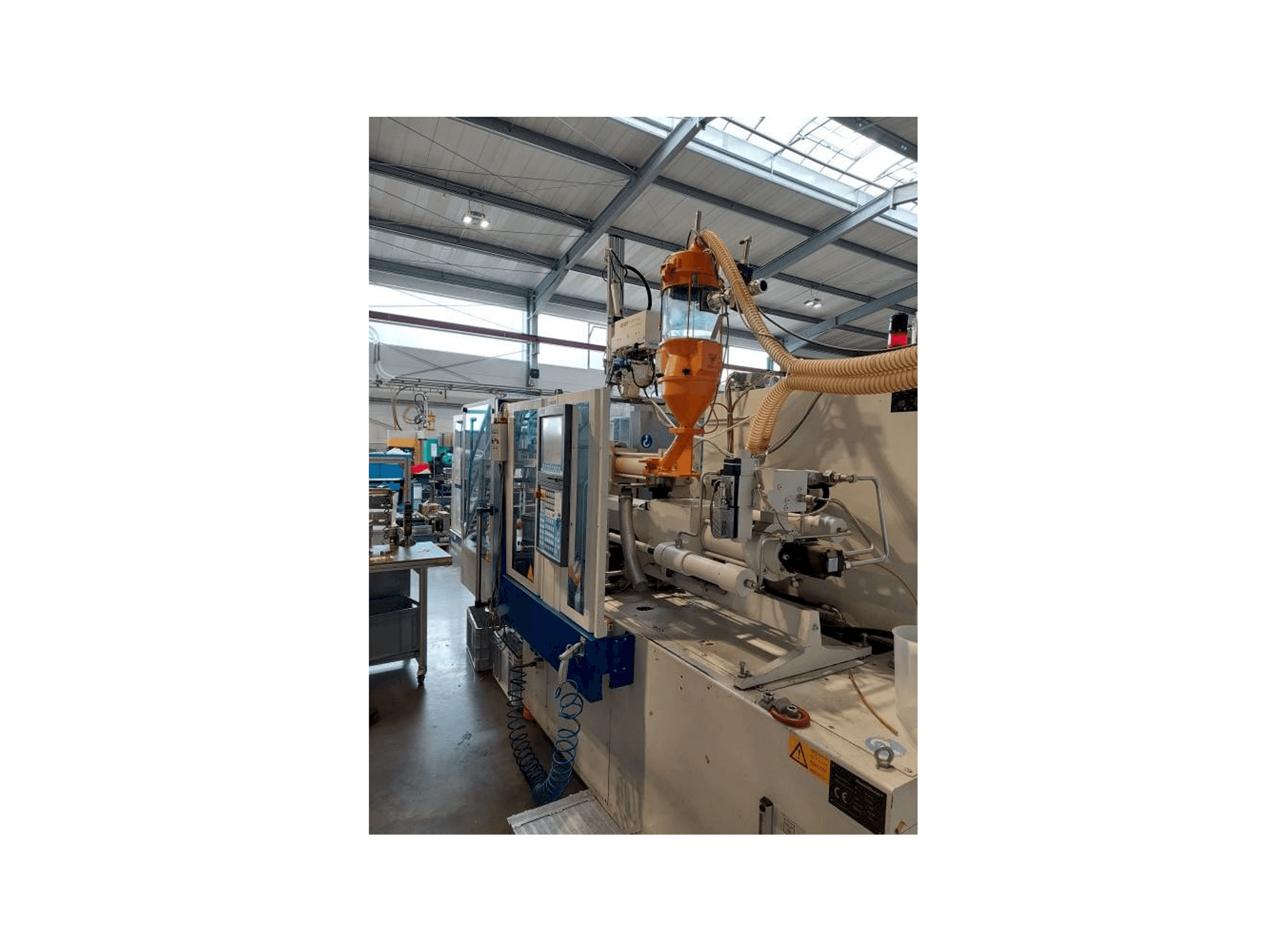 Krauss Maffei 80-180 CX-maskinen framifrån