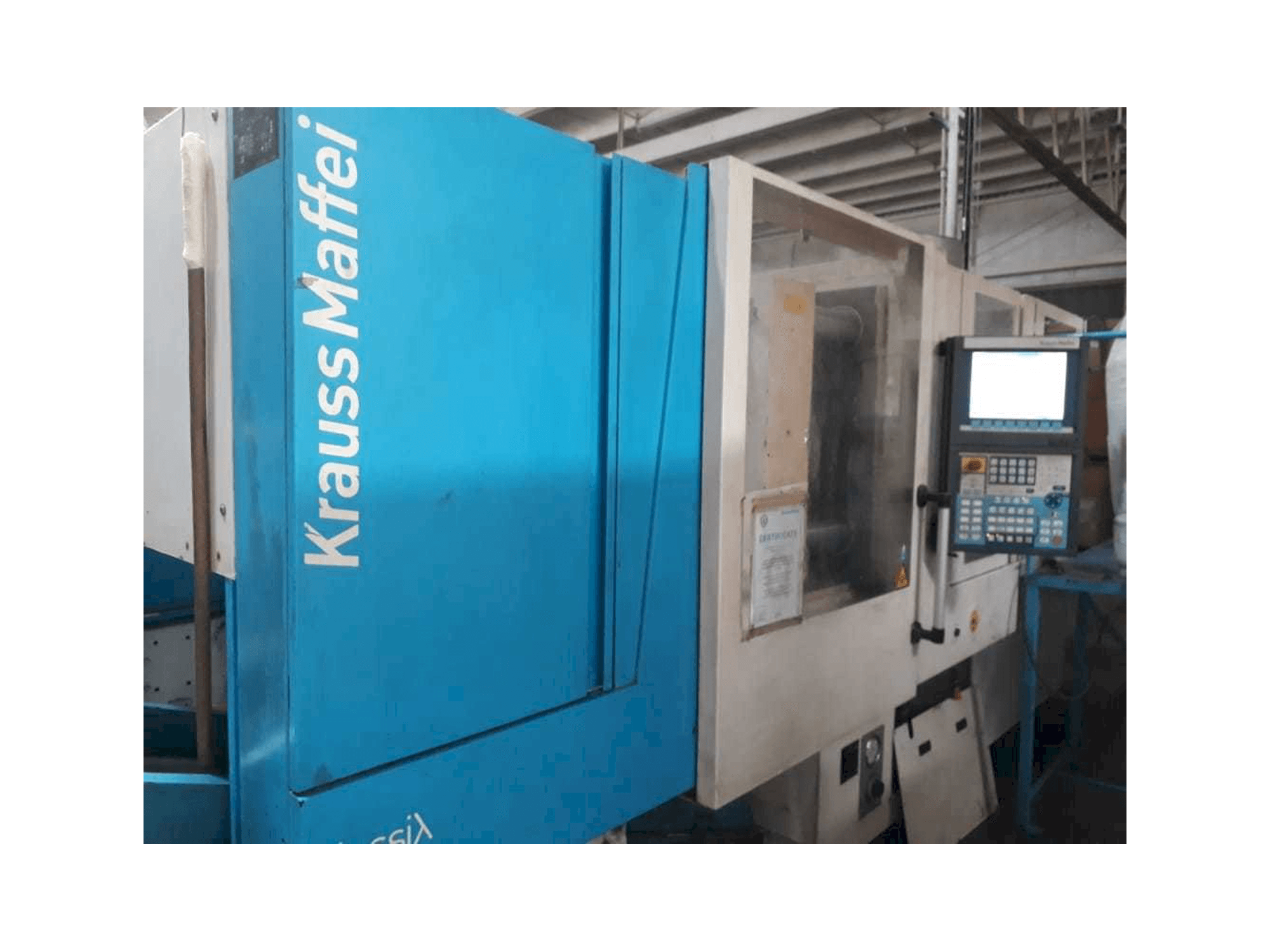 Krauss Maffei 160/750 CX-maskinen framifrån