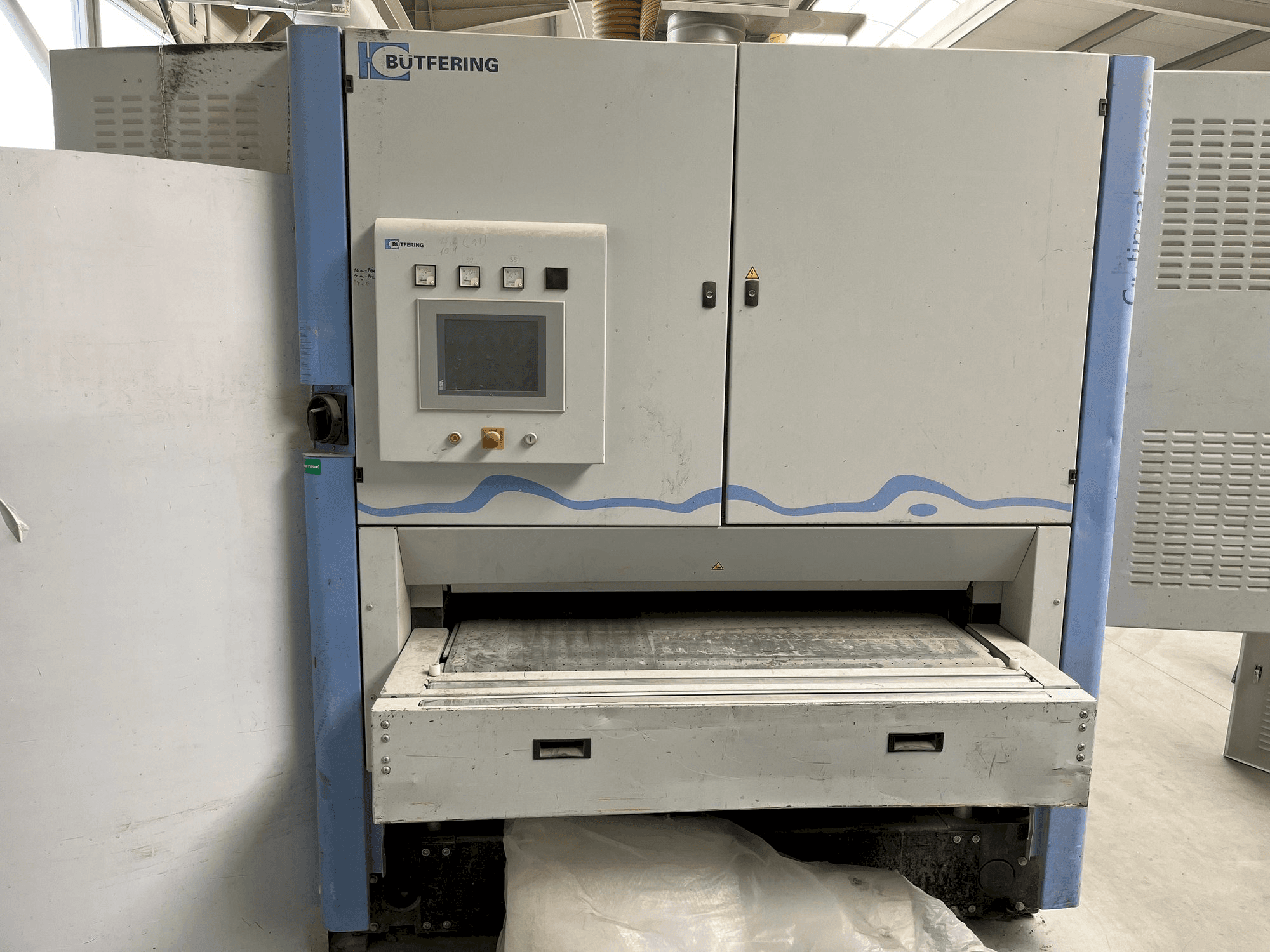 BUTFERING OPTIMAT SCO313 MRR-maskinen framifrån