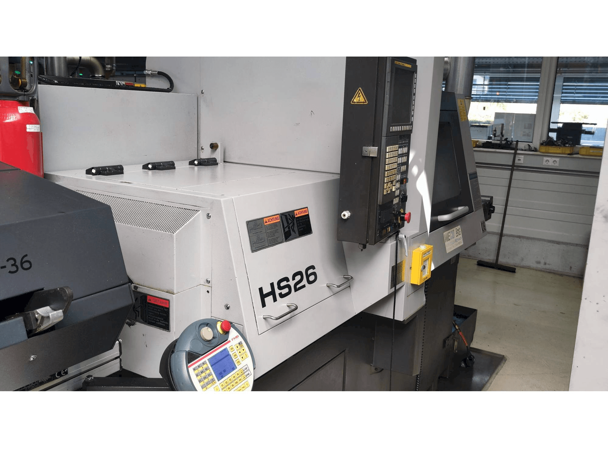 TSUGAMI HS26-maskinen sedd från vänster sida