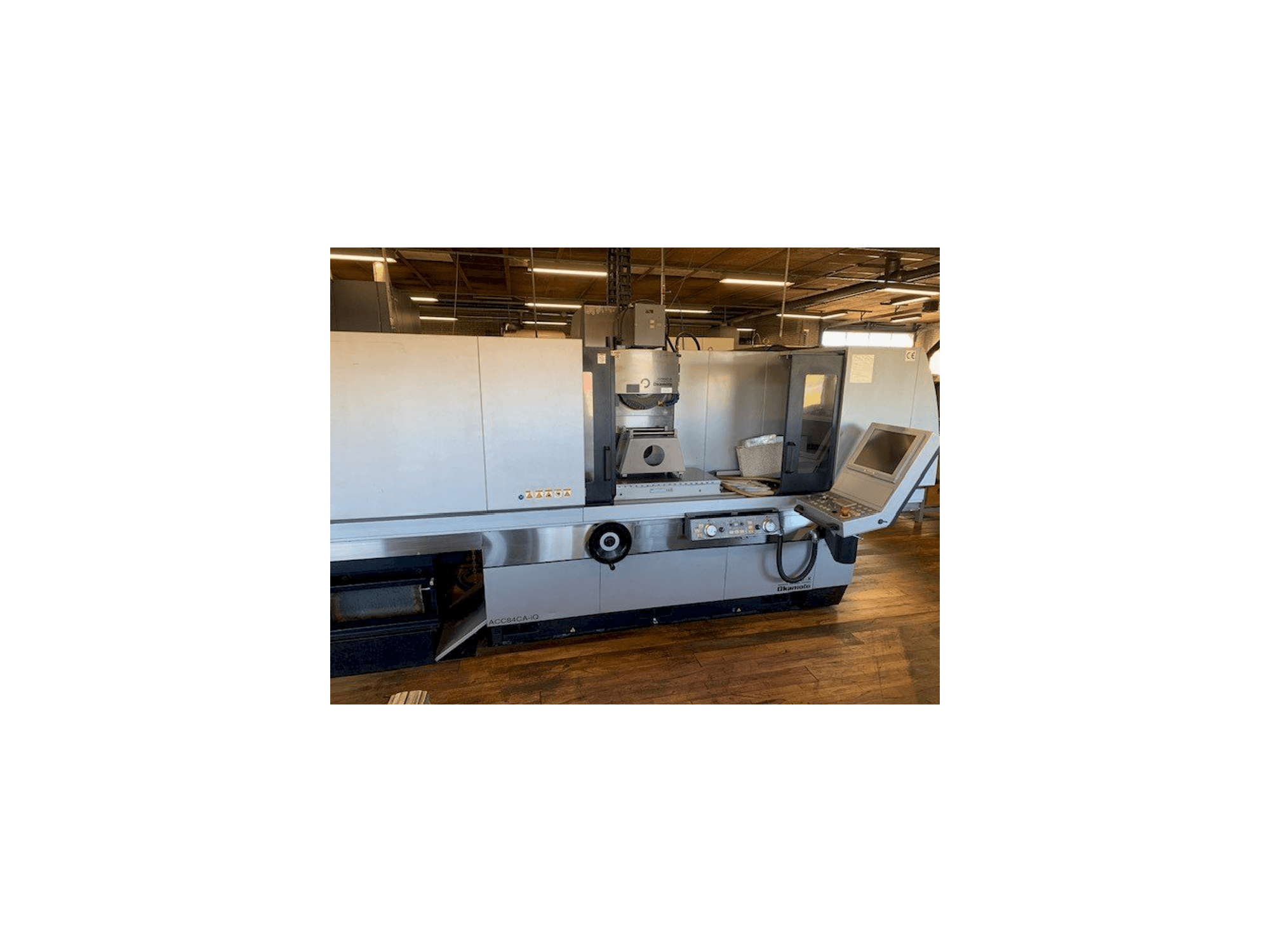 OKAMOTO ACC 84CA-iQ-maskinen framifrån