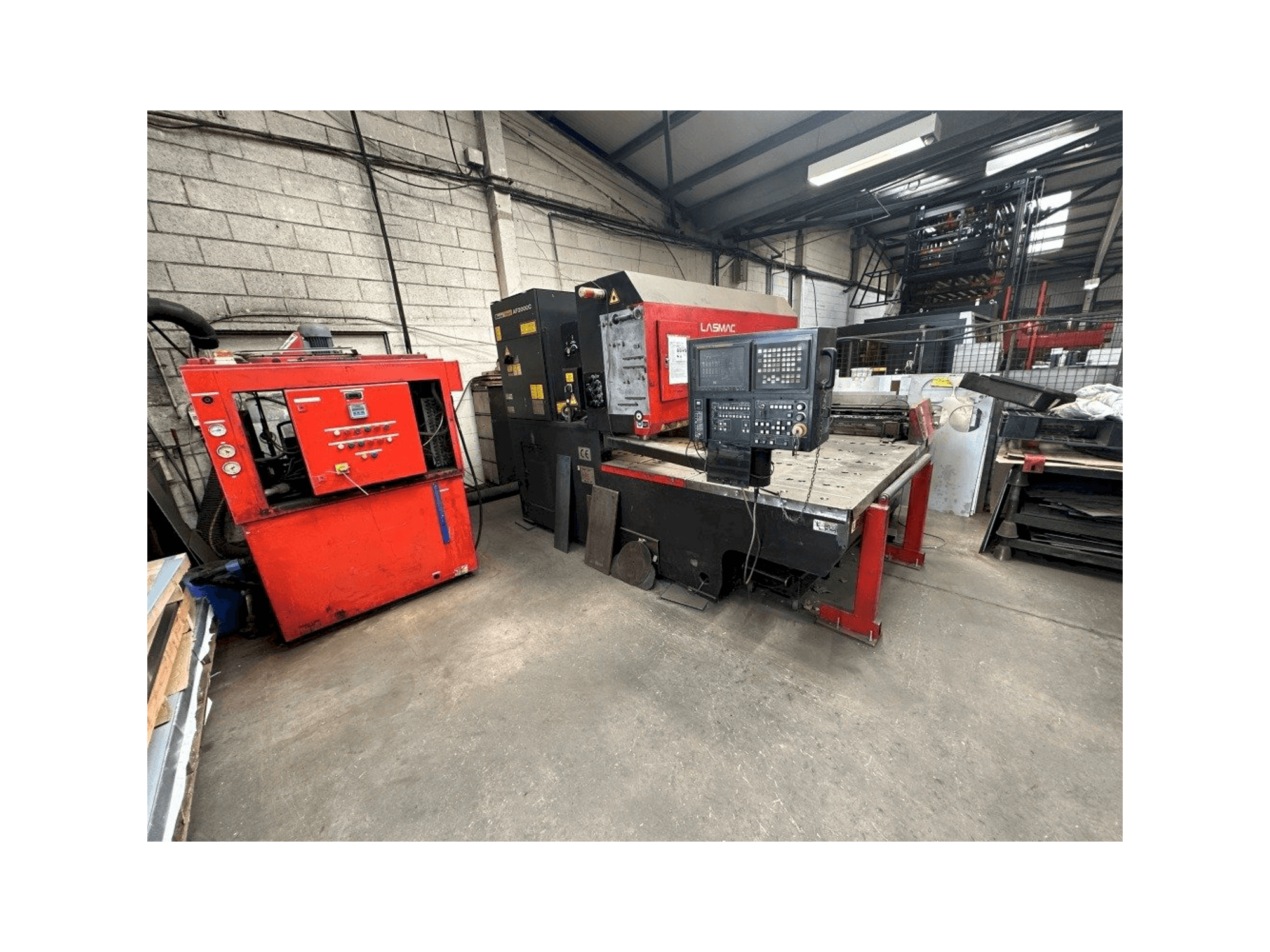 AMADA Lasmac LC1212A3-maskinen framifrån