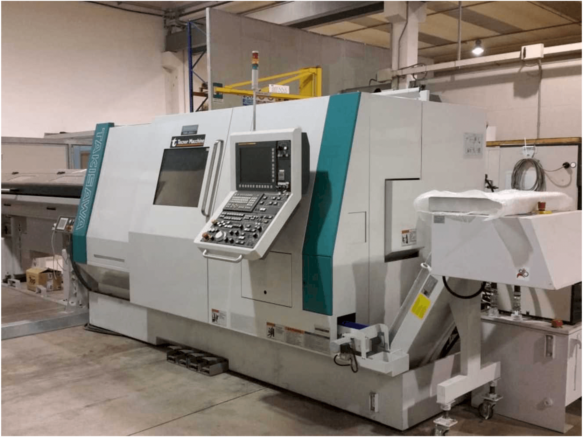 Takisawa TMMY-250 M1-maskinen framifrån