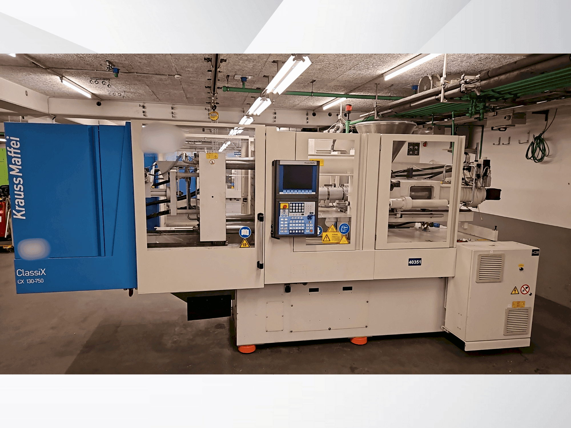 Krauss Maffei 130-750 CX-maskinen framifrån