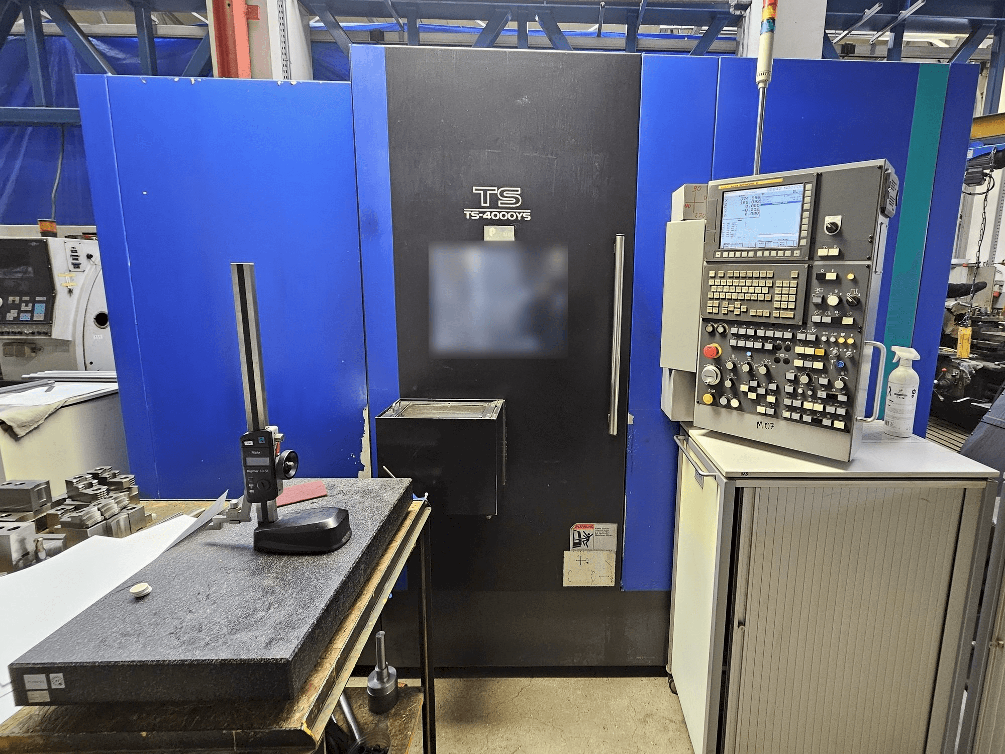 Takisawa TS-4000YS-maskinen framifrån