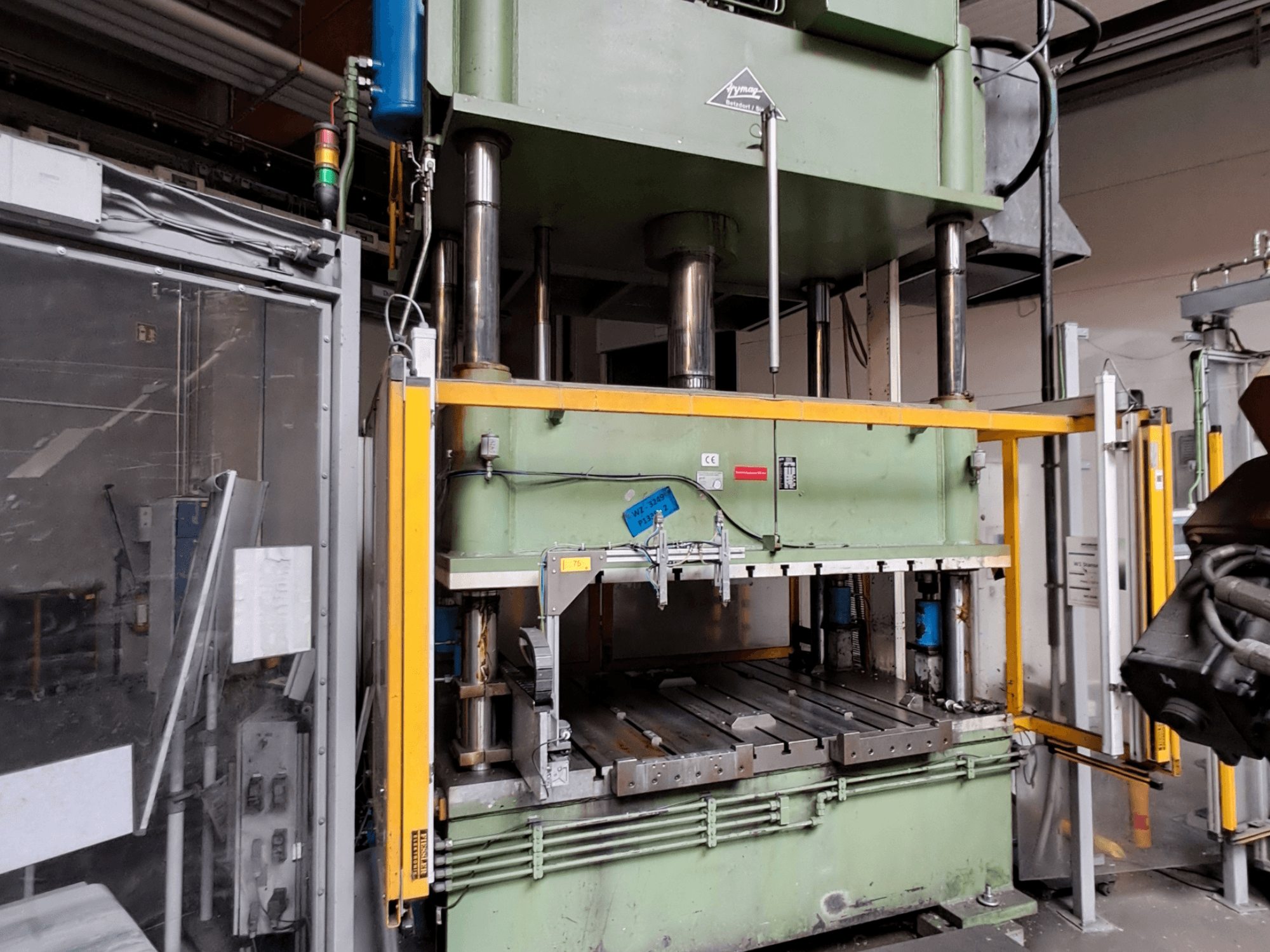 Metallpress HS 4 160-K från Other, framifrån, med en stor grön ram, hydraulcylindrar och skyddsanordningar.