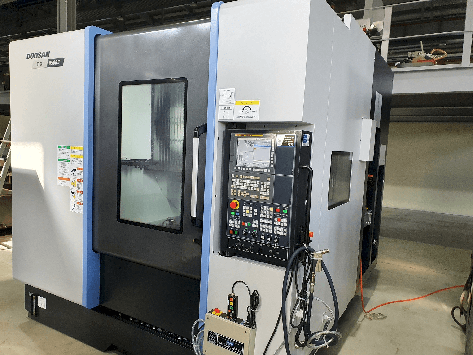 Doosan NX6500Ⅱ-maskinen framifrån