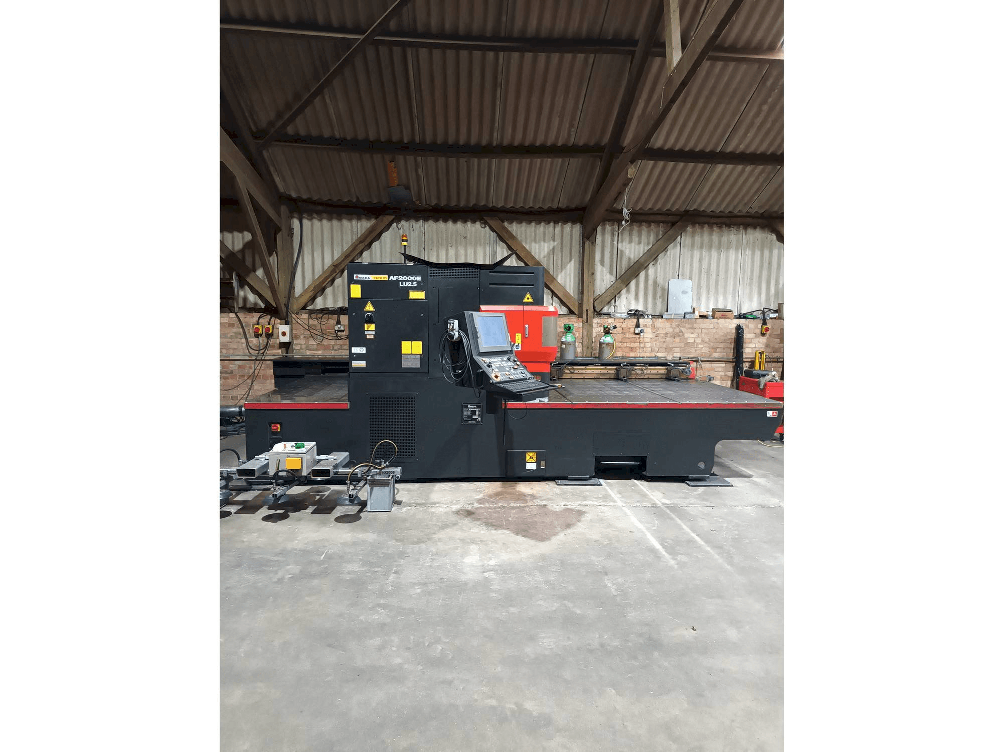 AMADA LC 2415 alpha 4 NT-maskinen framifrån