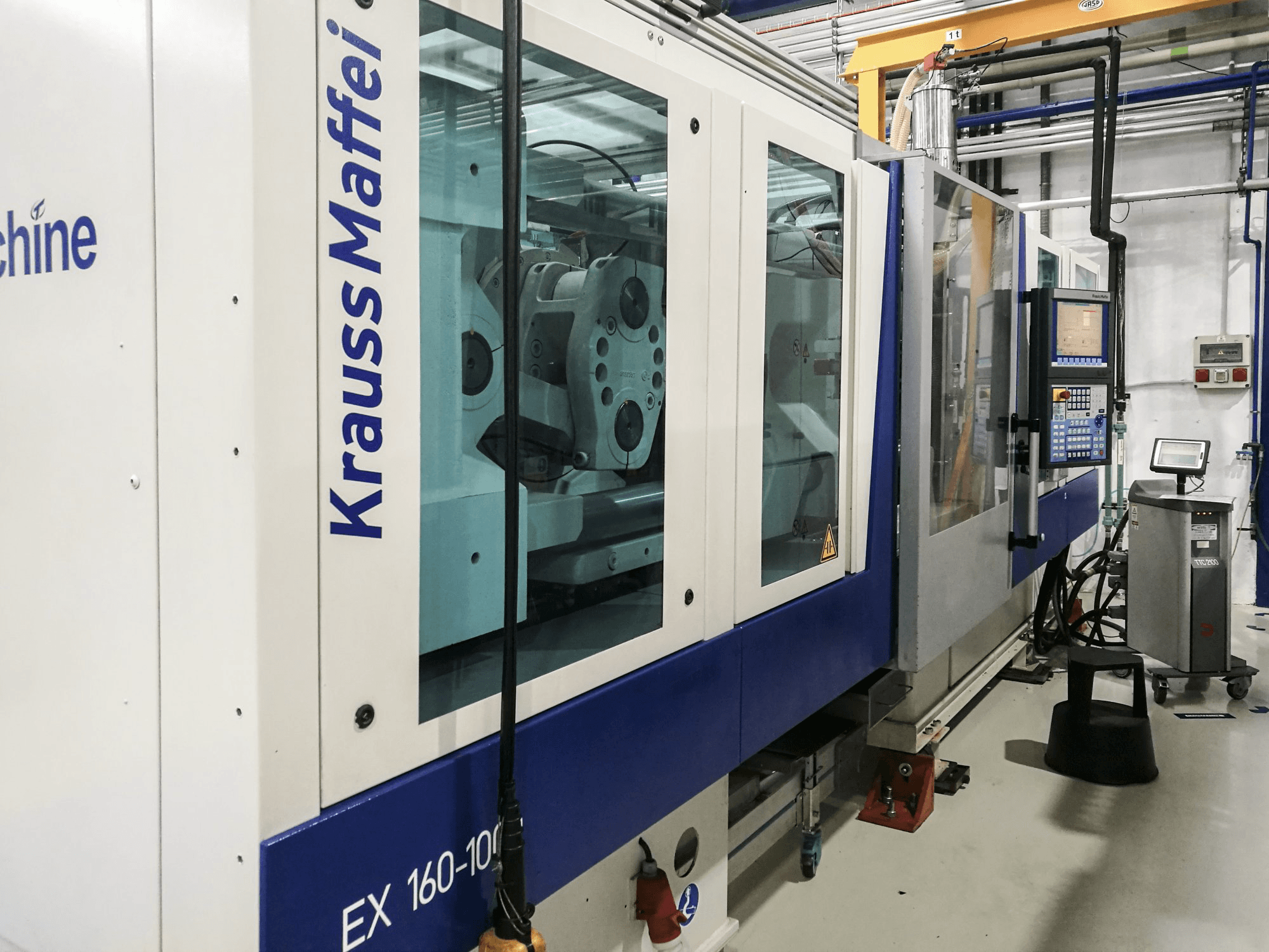 Krauss Maffei-maskinen sedd från vänster160-1000 EX