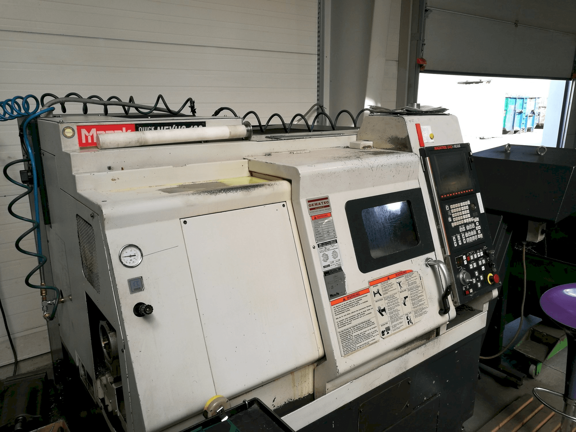 Mazak QT NEXUS 100-maskinen sedd från vänster sida