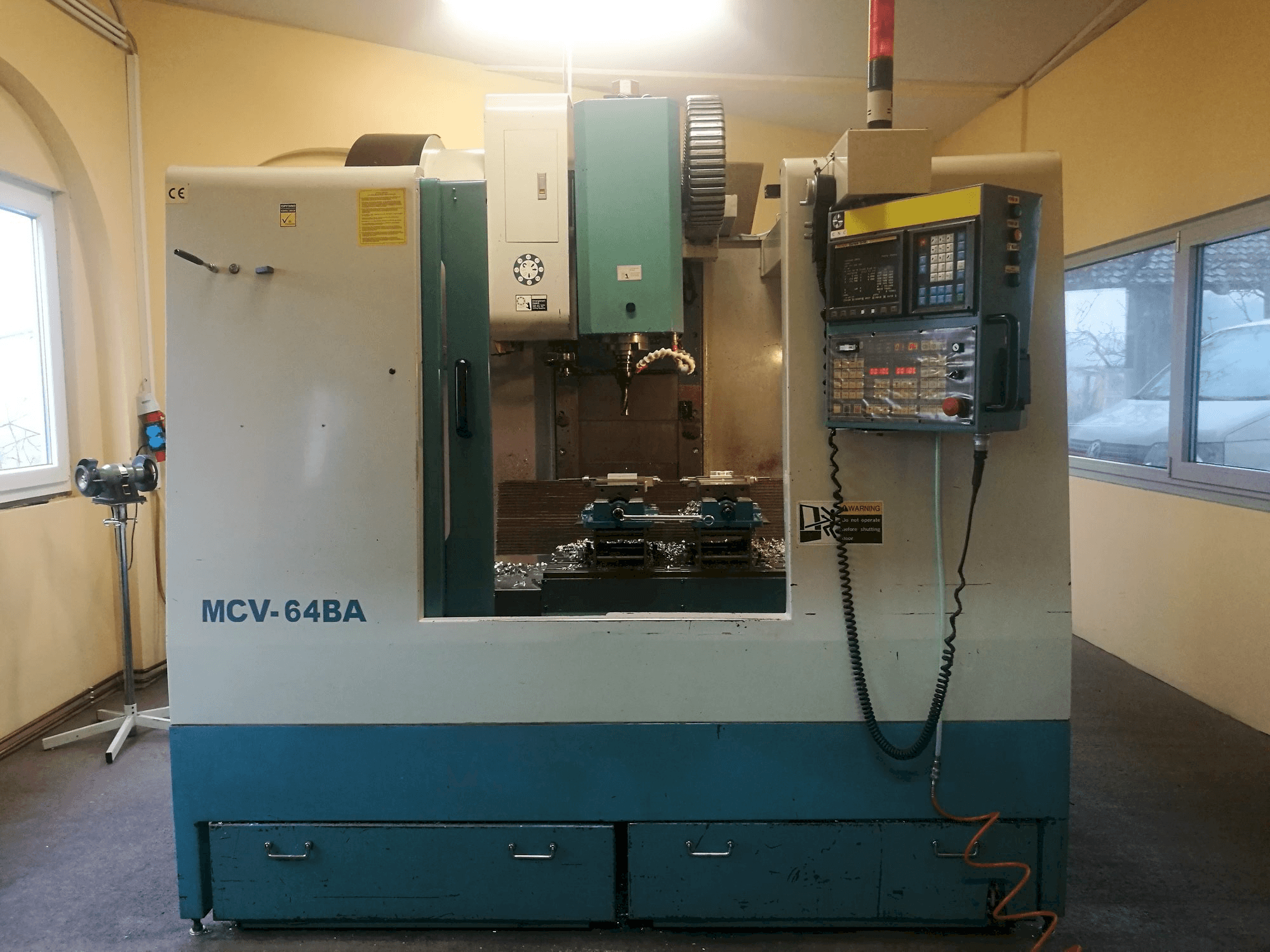 PJM MCV-64BA-maskinen framifrån
