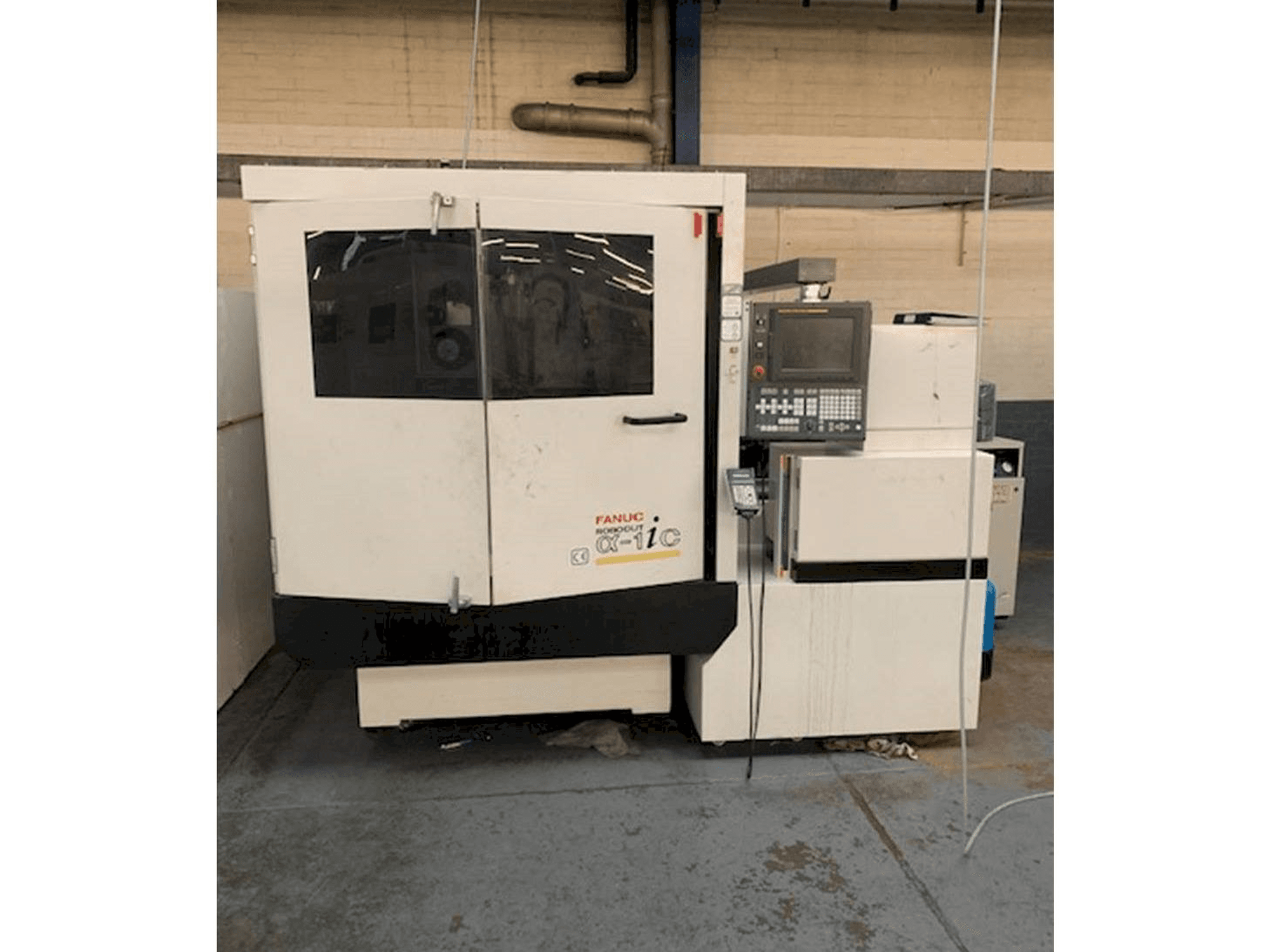 FANUC ROBOCUT Alpha -1iC S Axis-maskinen framifrån