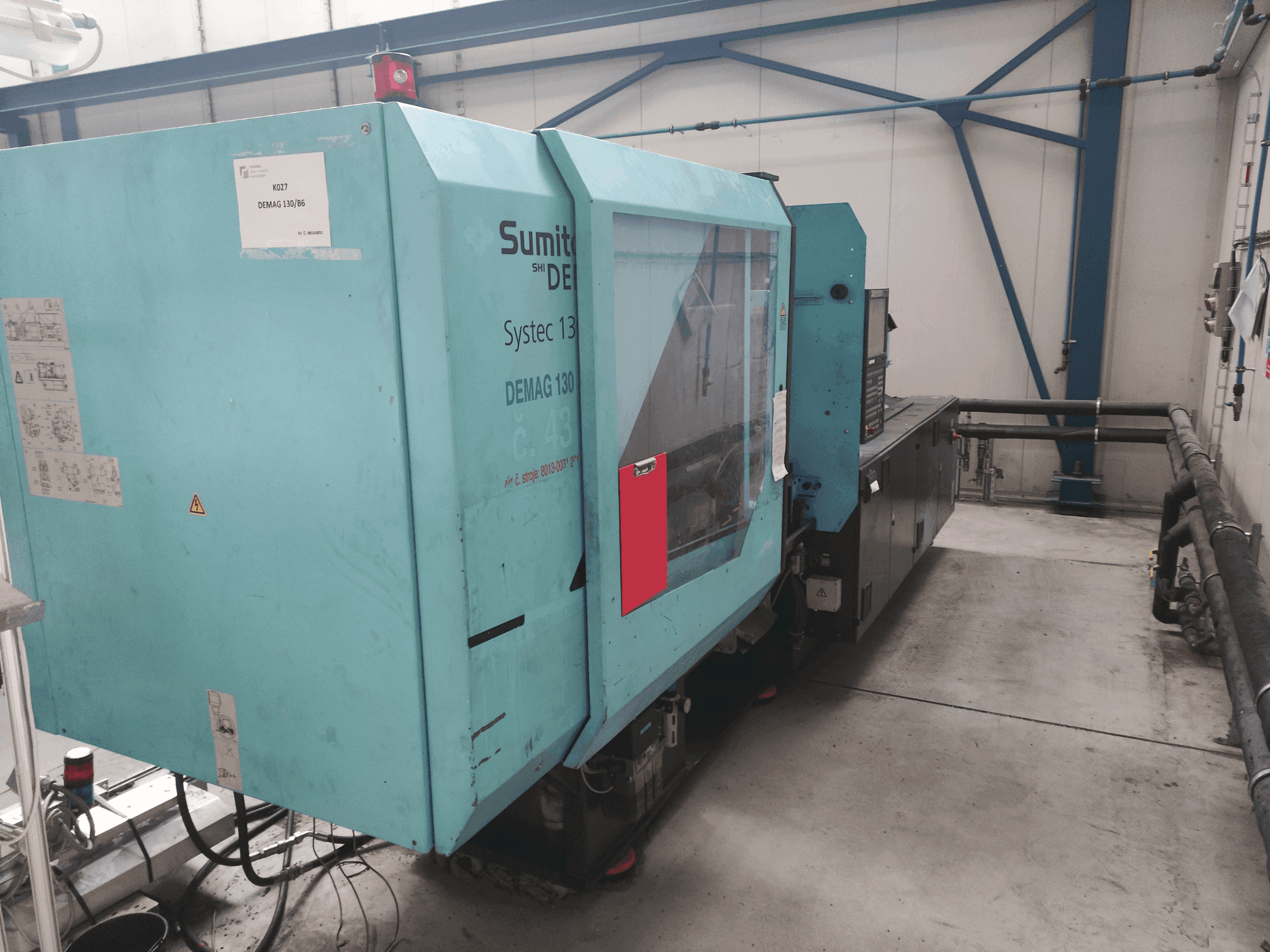 DEMAG Systec 130/475-430-maskinen framifrån