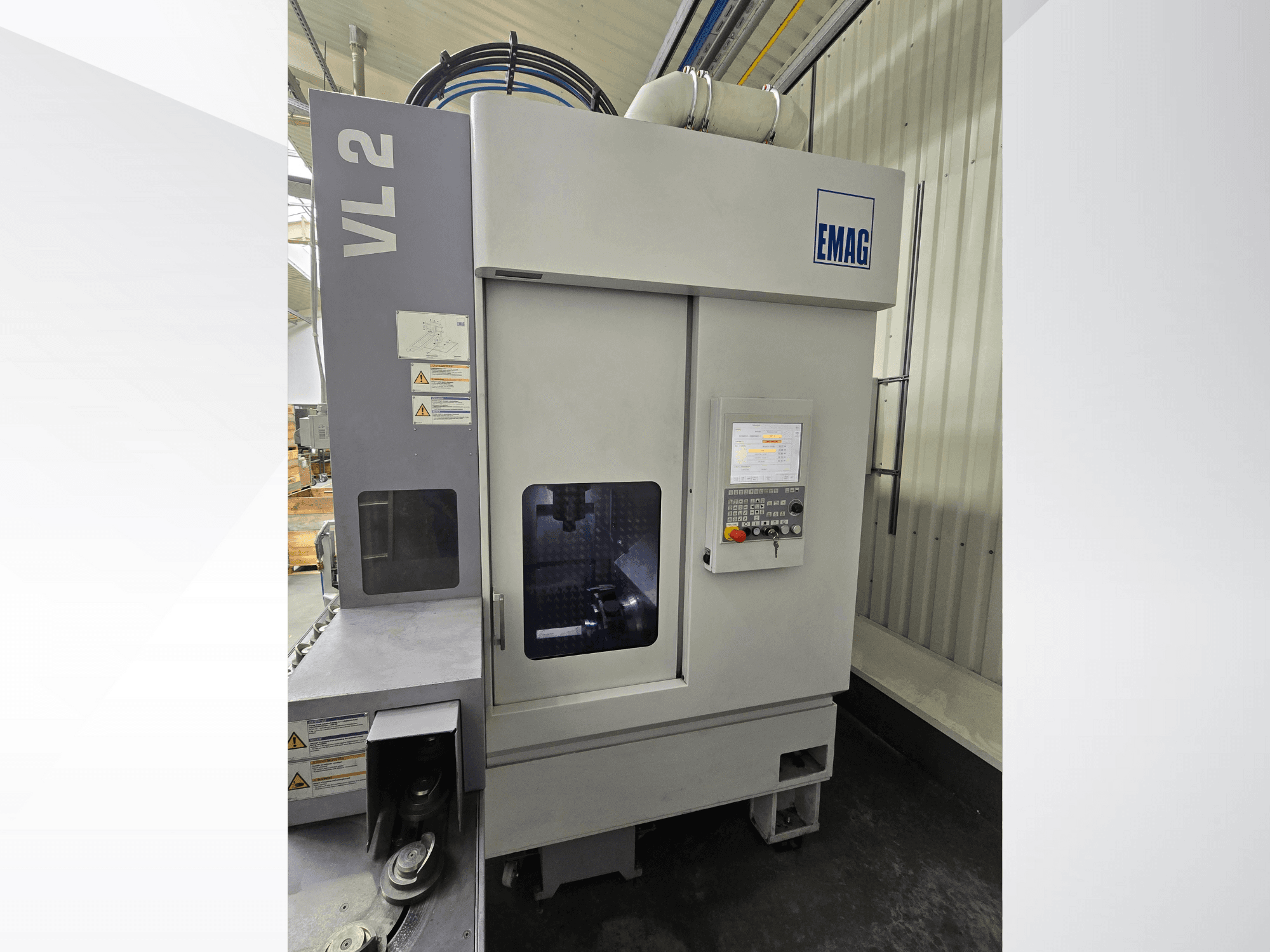 EMAG VL 2 precisionsmaskin från framsidan, med digital kontrollpanel och visningsfönster för driftkontroller.