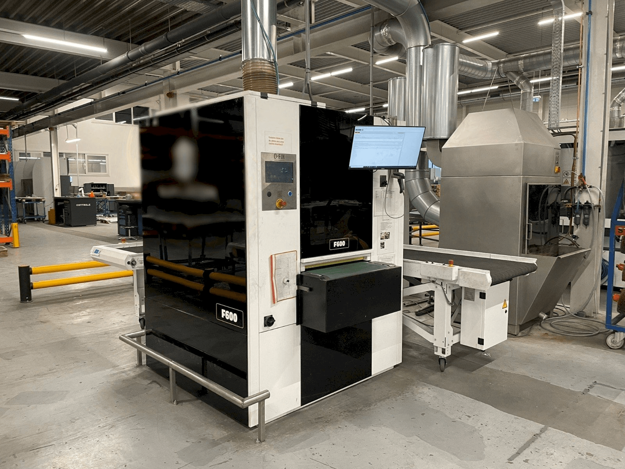 Q-FIN F600-maskinen framifrån