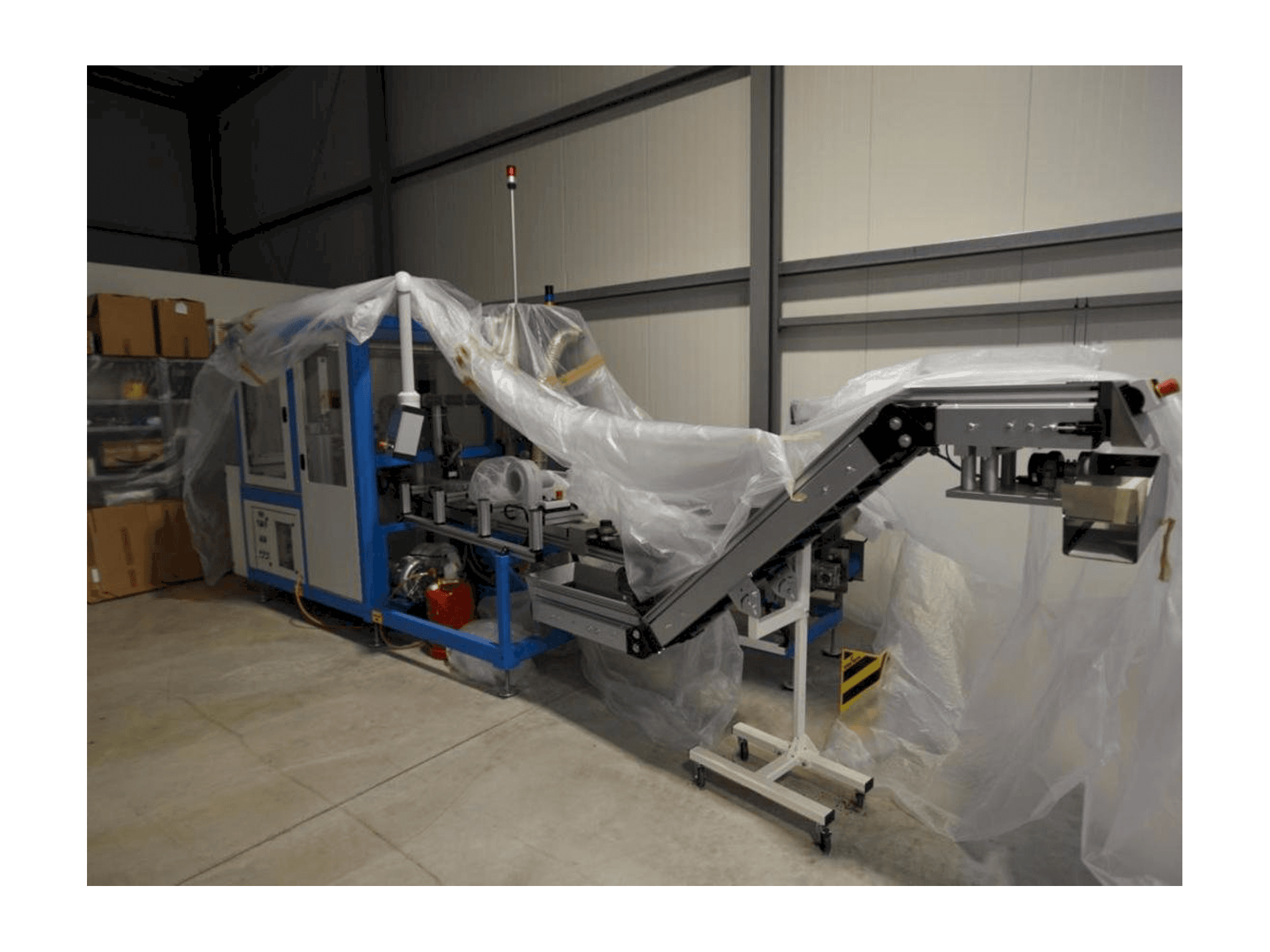 TAMPOPRINT Closure Print C-maskinen sedd från vänster sida