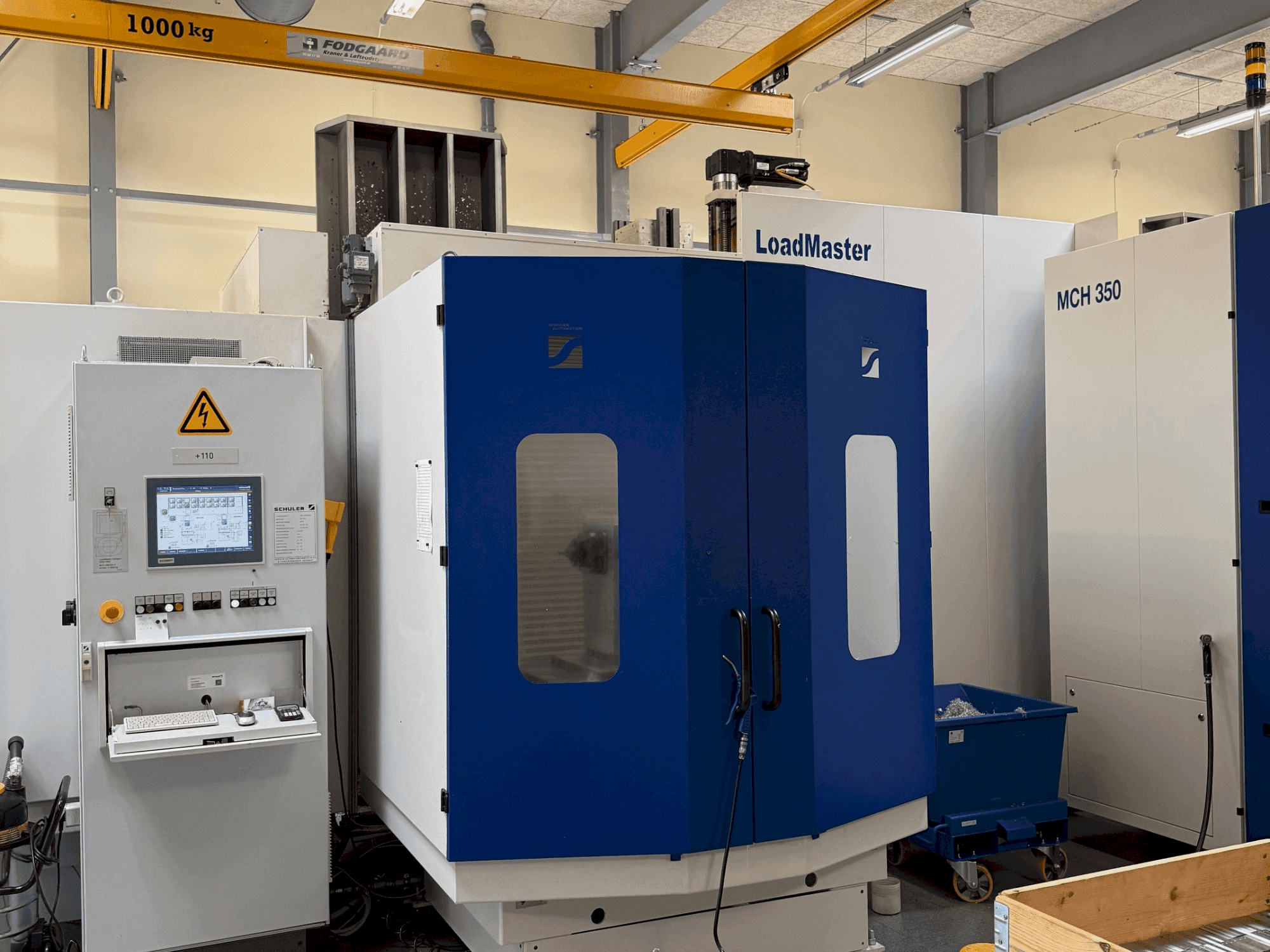 HELLER MCH 300 + MCH 300 C + 22 pallet system-maskinen framifrån